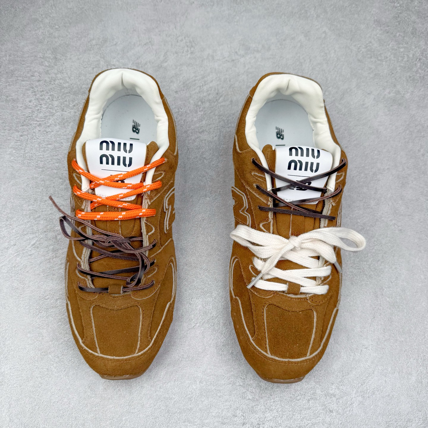 图片[2]-＃福利特价 MiuMiu x New Balance NB530 SL缪缪联名系列低帮经典复古休闲运动慢跑鞋 近几年运动品牌与各大潮流品牌不断推出联名产品，在球鞋圈拥有极高的热度。此外，奢侈品牌和运动品牌联名也早已非新鲜事，继 Dior 和 Jordan Brand 以及 Prada 和 adidas 合作后。近日，Miu Miu与New Balance的合作基本已经成为定番，每年都会上新，而近期的最新联名也已经正式曝光，预计会在24年春夏面世！相比之前两次使用的574，这次Miu Miu带来了全新风格。采用了全新型号MR530进行设计，继续使用复古的旧化效果和去年就被带火的美拉德配色打造。Miu Miu作为千禧文化的重要推手，这次也是直接挑选了New Balance 2000年代时发布的健身跑鞋MR530。整体做旧效果非常明显，甚至有些二手鞋的感觉，多少是有点瘦巴黎世家影响了……配色方面将会推出米色和棕色两种颜色可供选择，整体覆盖了做旧麂皮，鞋舌和鞋垫和之前一致，有Miu Miu的Logo，同时搭配皮革和棉质双鞋带组成。尺码：35.5 36 37 37.5 38 38.5 39.5 40 40.5 41.5 42 42.5 43.5 44 45-选品中心