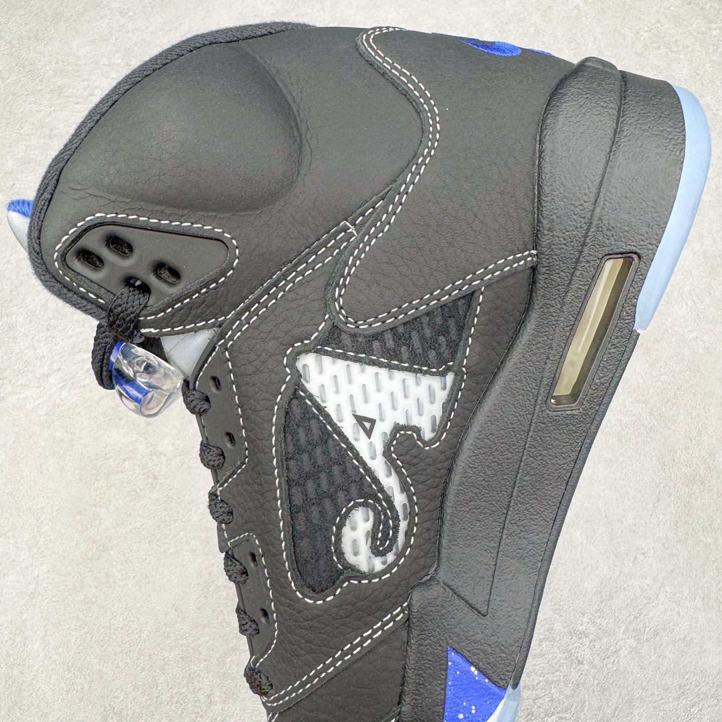 图片[7]-＃PK纯原 Awake NY x Air Jordan AJ5 联名黑蓝 DV4982-004 SZ原厂全套原楦原纸板磨具开发 原厂皮料加持 原厂港宝加持定型后跟R度完美 同源原厂电绣 飞人针数密度立体效果一致 原厂拉帮手法 原厂配置纸衬高频鞋盒 原厂指令配双鞋带 原厂TPU网格鞋带扣 超高鞋面清洁度 最高QC检验标准 控制溢胶瑕疵 到手可放心比对发售原鞋 上脚百分百充正驾驭 尺码：40 40.5 41 42 42.5 43 44 44.5 45 46 47.5-选品中心