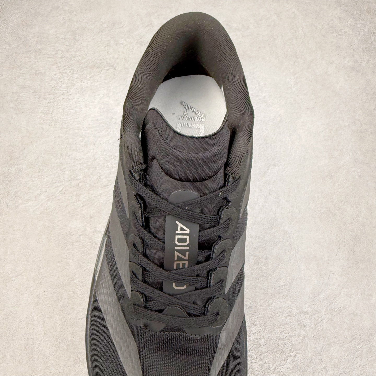 图片[5]-＃福利特价 AD Adizero EVO SL 马拉松竞速专业跑鞋 CELERMESH针织网面非常轻薄 纤维间的缝隙很大 可以保证跑步时的透气、排汗效果 鞋舌直接与两侧的内衬和鞋底连接在一起 在跑步过程中不会被鞋舌的左右移动所困扰 在标准鞋带孔的基础上再拓宽一组鞋带孔 适合不同脚型的需求 突破性 EnergyRods 技术，有助于跑者实现更好的成绩 中底独特的LIGHTSTRIKE PRO泡棉材质 微弹感觉在跑步过程中给予了良好的支撑体验 对于顶级精英和高水平进阶跑者来说 ADIOS PRO是一双值得信赖的竞速比赛用鞋 尺码：36 36.5 37.5 38 38.5 39 40 40.5 41 42 42.5 43 44 44.5 45-选品中心