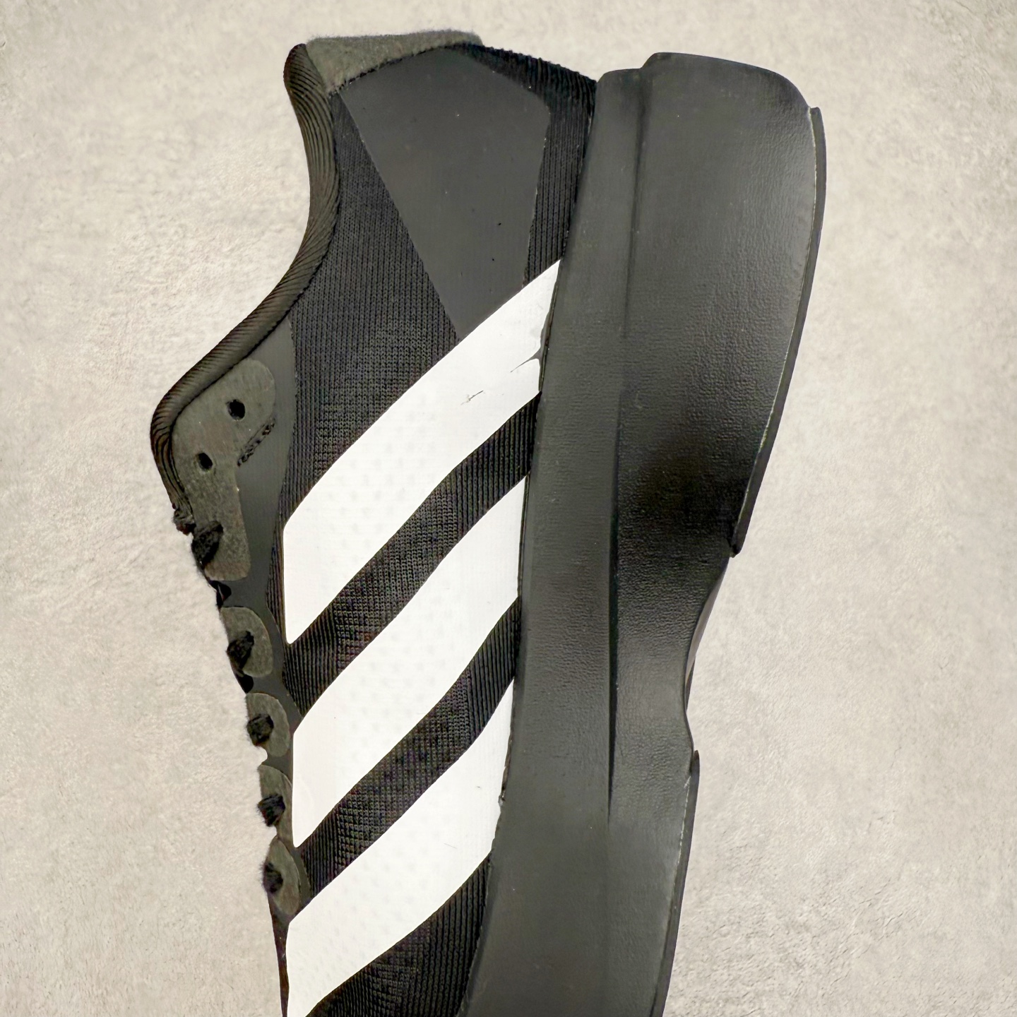 图片[7]-＃福利特价 AD Adizero EVO SL 马拉松竞速专业跑鞋 CELERMESH针织网面非常轻薄 纤维间的缝隙很大 可以保证跑步时的透气、排汗效果 鞋舌直接与两侧的内衬和鞋底连接在一起 在跑步过程中不会被鞋舌的左右移动所困扰 在标准鞋带孔的基础上再拓宽一组鞋带孔 适合不同脚型的需求 突破性 EnergyRods 技术，有助于跑者实现更好的成绩 中底独特的LIGHTSTRIKE PRO泡棉材质 微弹感觉在跑步过程中给予了良好的支撑体验 对于顶级精英和高水平进阶跑者来说 ADIOS PRO是一双值得信赖的竞速比赛用鞋 尺码：36 36.5 37.5 38 38.5 39 40 40.5 41 42 42.5 43 44 44.5 45-选品中心