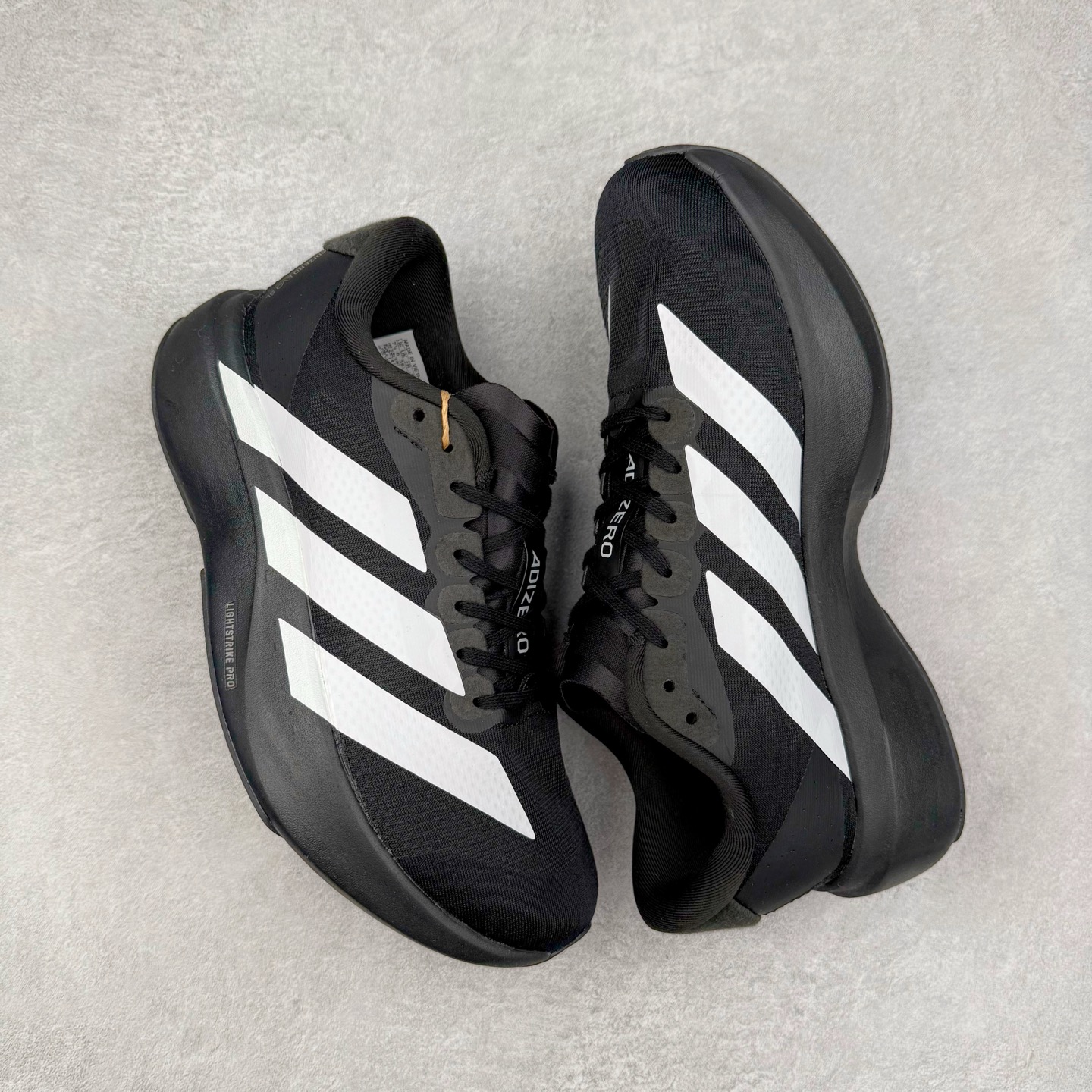 图片[3]-＃福利特价 AD Adizero EVO SL 马拉松竞速专业跑鞋 CELERMESH针织网面非常轻薄 纤维间的缝隙很大 可以保证跑步时的透气、排汗效果 鞋舌直接与两侧的内衬和鞋底连接在一起 在跑步过程中不会被鞋舌的左右移动所困扰 在标准鞋带孔的基础上再拓宽一组鞋带孔 适合不同脚型的需求 突破性 EnergyRods 技术，有助于跑者实现更好的成绩 中底独特的LIGHTSTRIKE PRO泡棉材质 微弹感觉在跑步过程中给予了良好的支撑体验 对于顶级精英和高水平进阶跑者来说 ADIOS PRO是一双值得信赖的竞速比赛用鞋 尺码：36 36.5 37.5 38 38.5 39 40 40.5 41 42 42.5 43 44 44.5 45-选品中心