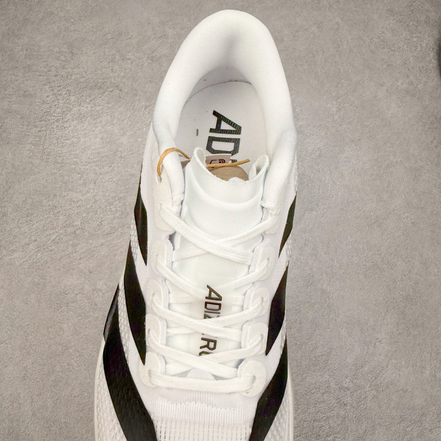 图片[5]-＃福利特价 AD Adizero EVO SL 马拉松竞速专业跑鞋 CELERMESH针织网面非常轻薄 纤维间的缝隙很大 可以保证跑步时的透气、排汗效果 鞋舌直接与两侧的内衬和鞋底连接在一起 在跑步过程中不会被鞋舌的左右移动所困扰 在标准鞋带孔的基础上再拓宽一组鞋带孔 适合不同脚型的需求 突破性 EnergyRods 技术，有助于跑者实现更好的成绩 中底独特的LIGHTSTRIKE PRO泡棉材质 微弹感觉在跑步过程中给予了良好的支撑体验 对于顶级精英和高水平进阶跑者来说 ADIOS PRO是一双值得信赖的竞速比赛用鞋 尺码：36 36.5 37.5 38 38.5 39 40 40.5 41 42 42.5 43 44 44.5 45-选品中心