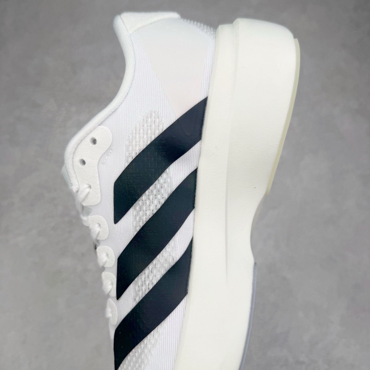 图片[7]-＃福利特价 AD Adizero EVO SL 马拉松竞速专业跑鞋 CELERMESH针织网面非常轻薄 纤维间的缝隙很大 可以保证跑步时的透气、排汗效果 鞋舌直接与两侧的内衬和鞋底连接在一起 在跑步过程中不会被鞋舌的左右移动所困扰 在标准鞋带孔的基础上再拓宽一组鞋带孔 适合不同脚型的需求 突破性 EnergyRods 技术，有助于跑者实现更好的成绩 中底独特的LIGHTSTRIKE PRO泡棉材质 微弹感觉在跑步过程中给予了良好的支撑体验 对于顶级精英和高水平进阶跑者来说 ADIOS PRO是一双值得信赖的竞速比赛用鞋 尺码：36 36.5 37.5 38 38.5 39 40 40.5 41 42 42.5 43 44 44.5 45-选品中心