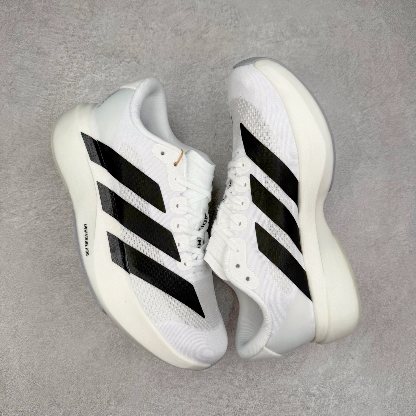 图片[3]-＃福利特价 AD Adizero EVO SL 马拉松竞速专业跑鞋 CELERMESH针织网面非常轻薄 纤维间的缝隙很大 可以保证跑步时的透气、排汗效果 鞋舌直接与两侧的内衬和鞋底连接在一起 在跑步过程中不会被鞋舌的左右移动所困扰 在标准鞋带孔的基础上再拓宽一组鞋带孔 适合不同脚型的需求 突破性 EnergyRods 技术，有助于跑者实现更好的成绩 中底独特的LIGHTSTRIKE PRO泡棉材质 微弹感觉在跑步过程中给予了良好的支撑体验 对于顶级精英和高水平进阶跑者来说 ADIOS PRO是一双值得信赖的竞速比赛用鞋 尺码：36 36.5 37.5 38 38.5 39 40 40.5 41 42 42.5 43 44 44.5 45-选品中心