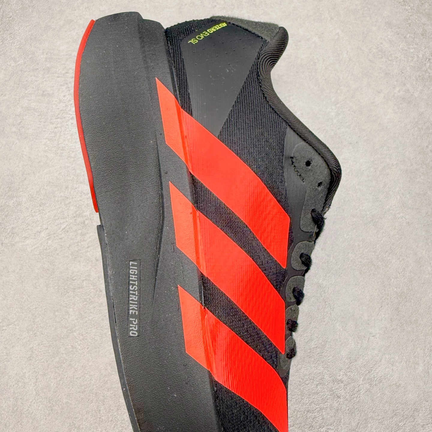 图片[6]-＃福利特价 AD Adizero EVO SL 马拉松竞速专业跑鞋 CELERMESH针织网面非常轻薄 纤维间的缝隙很大 可以保证跑步时的透气、排汗效果 鞋舌直接与两侧的内衬和鞋底连接在一起 在跑步过程中不会被鞋舌的左右移动所困扰 在标准鞋带孔的基础上再拓宽一组鞋带孔 适合不同脚型的需求 突破性 EnergyRods 技术，有助于跑者实现更好的成绩 中底独特的LIGHTSTRIKE PRO泡棉材质 微弹感觉在跑步过程中给予了良好的支撑体验 对于顶级精英和高水平进阶跑者来说 ADIOS PRO是一双值得信赖的竞速比赛用鞋 尺码：36 36.5 37.5 38 38.5 39 40 40.5 41 42 42.5 43 44 44.5 45-选品中心