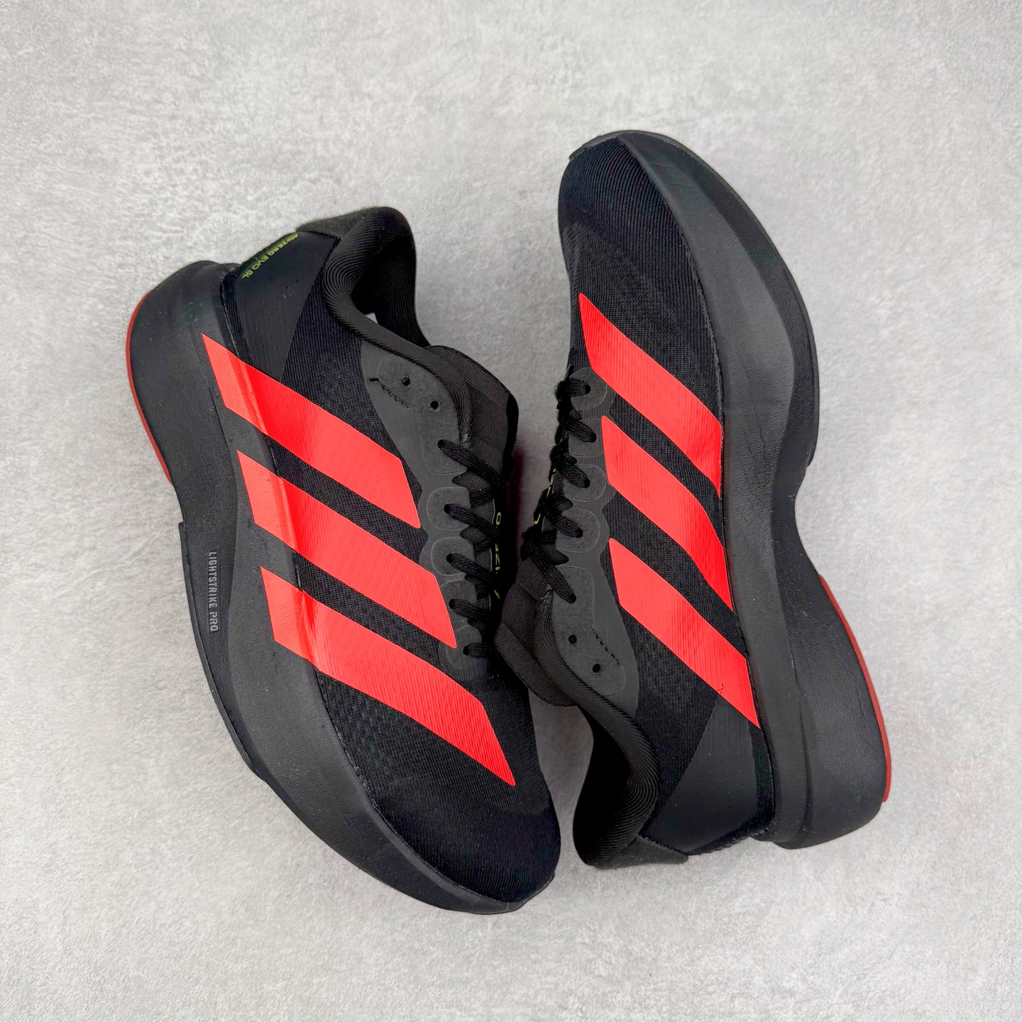 图片[3]-＃福利特价 AD Adizero EVO SL 马拉松竞速专业跑鞋 CELERMESH针织网面非常轻薄 纤维间的缝隙很大 可以保证跑步时的透气、排汗效果 鞋舌直接与两侧的内衬和鞋底连接在一起 在跑步过程中不会被鞋舌的左右移动所困扰 在标准鞋带孔的基础上再拓宽一组鞋带孔 适合不同脚型的需求 突破性 EnergyRods 技术，有助于跑者实现更好的成绩 中底独特的LIGHTSTRIKE PRO泡棉材质 微弹感觉在跑步过程中给予了良好的支撑体验 对于顶级精英和高水平进阶跑者来说 ADIOS PRO是一双值得信赖的竞速比赛用鞋 尺码：36 36.5 37.5 38 38.5 39 40 40.5 41 42 42.5 43 44 44.5 45-选品中心