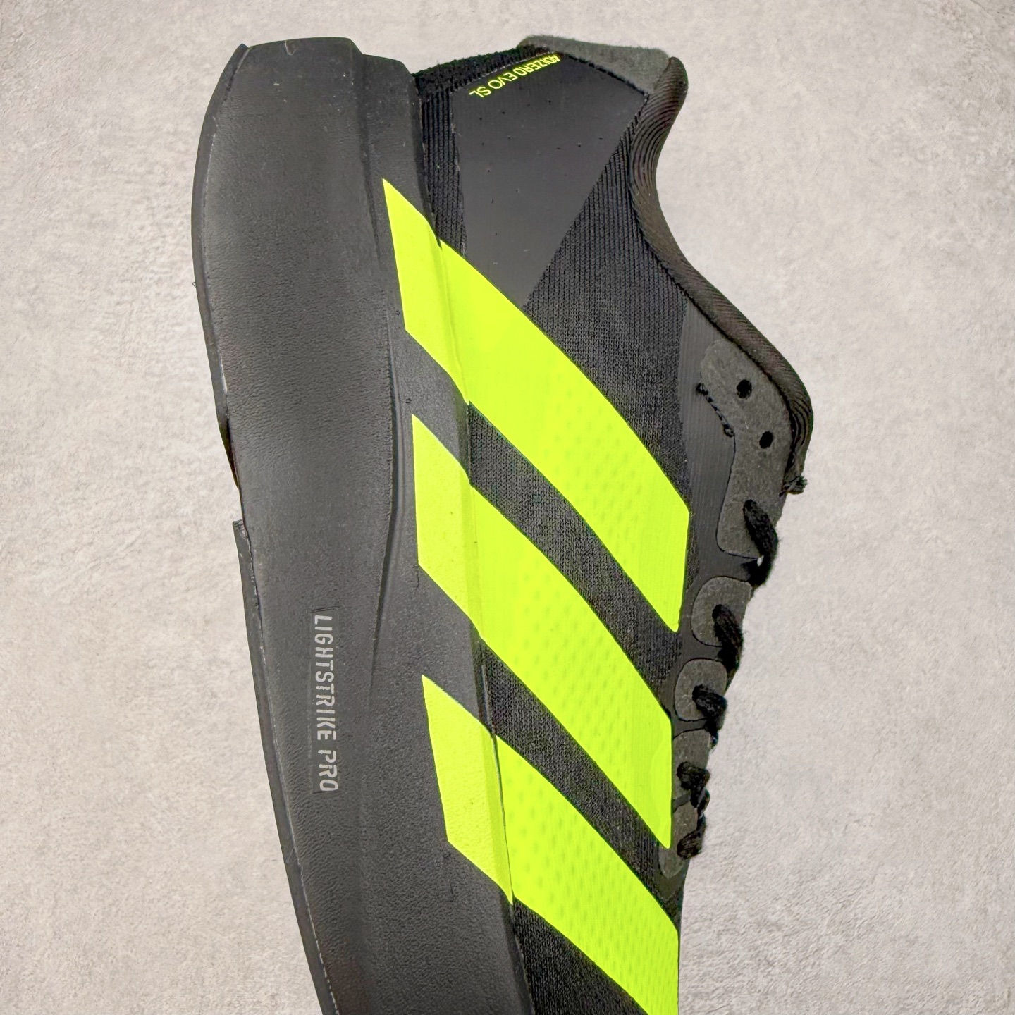 图片[6]-＃福利特价 AD Adizero EVO SL 马拉松竞速专业跑鞋 CELERMESH针织网面非常轻薄 纤维间的缝隙很大 可以保证跑步时的透气、排汗效果 鞋舌直接与两侧的内衬和鞋底连接在一起 在跑步过程中不会被鞋舌的左右移动所困扰 在标准鞋带孔的基础上再拓宽一组鞋带孔 适合不同脚型的需求 突破性 EnergyRods 技术，有助于跑者实现更好的成绩 中底独特的LIGHTSTRIKE PRO泡棉材质 微弹感觉在跑步过程中给予了良好的支撑体验 对于顶级精英和高水平进阶跑者来说 ADIOS PRO是一双值得信赖的竞速比赛用鞋 尺码：36 36.5 37.5 38 38.5 39 40 40.5 41 42 42.5 43 44 44.5 45-选品中心