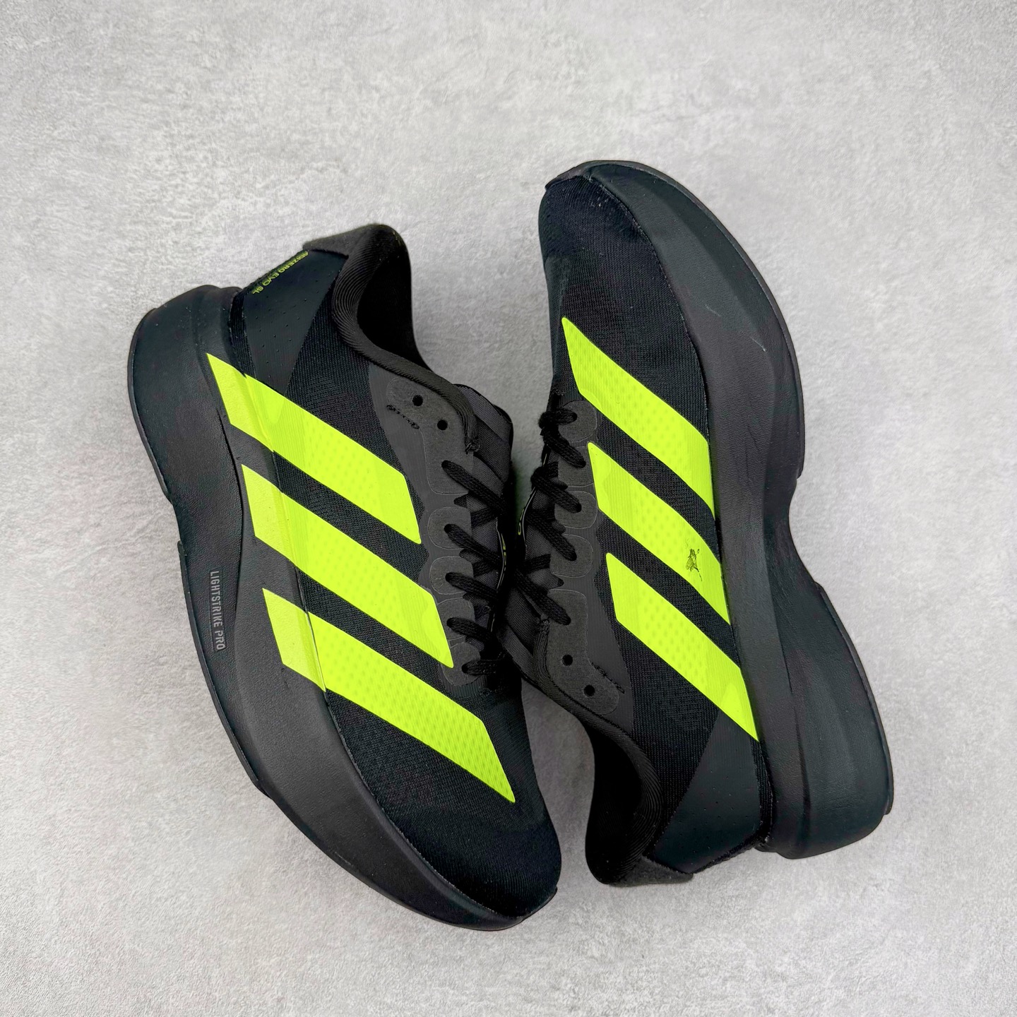 图片[3]-＃福利特价 AD Adizero EVO SL 马拉松竞速专业跑鞋 CELERMESH针织网面非常轻薄 纤维间的缝隙很大 可以保证跑步时的透气、排汗效果 鞋舌直接与两侧的内衬和鞋底连接在一起 在跑步过程中不会被鞋舌的左右移动所困扰 在标准鞋带孔的基础上再拓宽一组鞋带孔 适合不同脚型的需求 突破性 EnergyRods 技术，有助于跑者实现更好的成绩 中底独特的LIGHTSTRIKE PRO泡棉材质 微弹感觉在跑步过程中给予了良好的支撑体验 对于顶级精英和高水平进阶跑者来说 ADIOS PRO是一双值得信赖的竞速比赛用鞋 尺码：36 36.5 37.5 38 38.5 39 40 40.5 41 42 42.5 43 44 44.5 45-选品中心