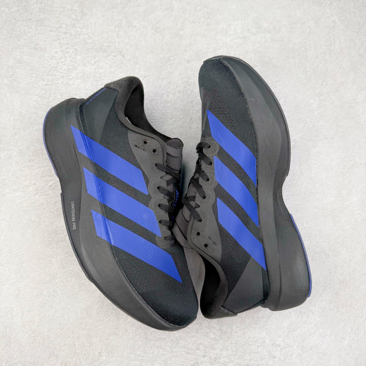 图片[3]-＃福利特价 AD Adizero EVO SL 马拉松竞速专业跑鞋 CELERMESH针织网面非常轻薄 纤维间的缝隙很大 可以保证跑步时的透气、排汗效果 鞋舌直接与两侧的内衬和鞋底连接在一起 在跑步过程中不会被鞋舌的左右移动所困扰 在标准鞋带孔的基础上再拓宽一组鞋带孔 适合不同脚型的需求 突破性 EnergyRods 技术，有助于跑者实现更好的成绩 中底独特的LIGHTSTRIKE PRO泡棉材质 微弹感觉在跑步过程中给予了良好的支撑体验 对于顶级精英和高水平进阶跑者来说 ADIOS PRO是一双值得信赖的竞速比赛用鞋 尺码：36 36.5 37.5 38 38.5 39 40 40.5 41 42 42.5 43 44 44.5 45-选品中心