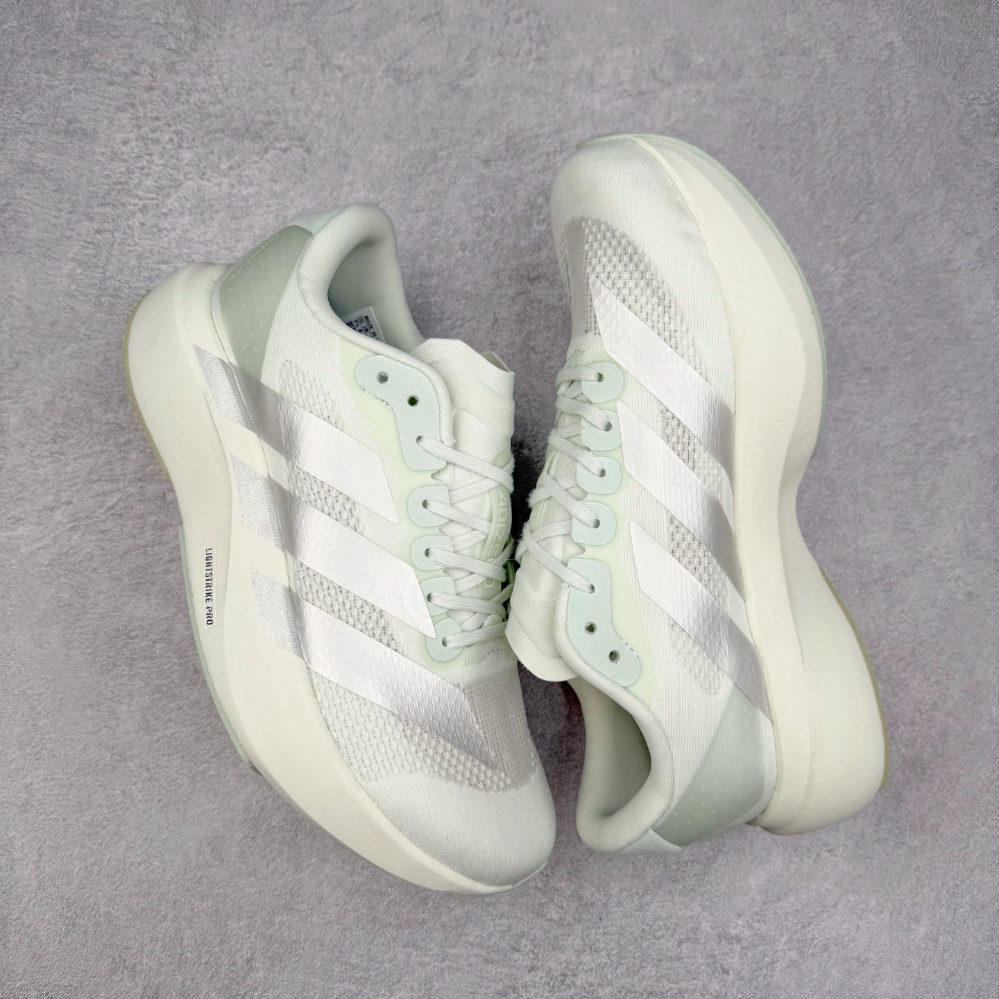 图片[3]-＃福利特价 AD Adizero EVO SL 马拉松竞速专业跑鞋 CELERMESH针织网面非常轻薄 纤维间的缝隙很大 可以保证跑步时的透气、排汗效果 鞋舌直接与两侧的内衬和鞋底连接在一起 在跑步过程中不会被鞋舌的左右移动所困扰 在标准鞋带孔的基础上再拓宽一组鞋带孔 适合不同脚型的需求 突破性 EnergyRods 技术，有助于跑者实现更好的成绩 中底独特的LIGHTSTRIKE PRO泡棉材质 微弹感觉在跑步过程中给予了良好的支撑体验 对于顶级精英和高水平进阶跑者来说 ADIOS PRO是一双值得信赖的竞速比赛用鞋 尺码：36 36.5 37.5 38 38.5 39 40 40.5 41 42 42.5 43 44 44.5 45-选品中心