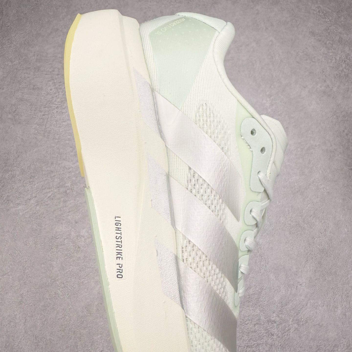 图片[6]-＃福利特价 AD Adizero EVO SL 马拉松竞速专业跑鞋 CELERMESH针织网面非常轻薄 纤维间的缝隙很大 可以保证跑步时的透气、排汗效果 鞋舌直接与两侧的内衬和鞋底连接在一起 在跑步过程中不会被鞋舌的左右移动所困扰 在标准鞋带孔的基础上再拓宽一组鞋带孔 适合不同脚型的需求 突破性 EnergyRods 技术，有助于跑者实现更好的成绩 中底独特的LIGHTSTRIKE PRO泡棉材质 微弹感觉在跑步过程中给予了良好的支撑体验 对于顶级精英和高水平进阶跑者来说 ADIOS PRO是一双值得信赖的竞速比赛用鞋 尺码：36 36.5 37.5 38 38.5 39 40 40.5 41 42 42.5 43 44 44.5 45-选品中心