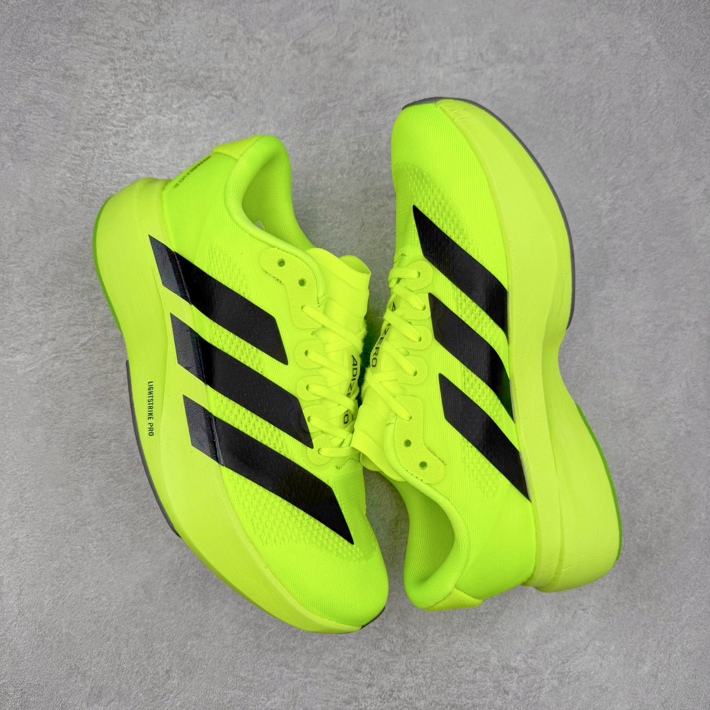 图片[3]-＃福利特价 AD Adizero EVO SL 马拉松竞速专业跑鞋 CELERMESH针织网面非常轻薄 纤维间的缝隙很大 可以保证跑步时的透气、排汗效果 鞋舌直接与两侧的内衬和鞋底连接在一起 在跑步过程中不会被鞋舌的左右移动所困扰 在标准鞋带孔的基础上再拓宽一组鞋带孔 适合不同脚型的需求 突破性 EnergyRods 技术，有助于跑者实现更好的成绩 中底独特的LIGHTSTRIKE PRO泡棉材质 微弹感觉在跑步过程中给予了良好的支撑体验 对于顶级精英和高水平进阶跑者来说 ADIOS PRO是一双值得信赖的竞速比赛用鞋 尺码：36 36.5 37.5 38 38.5 39 40 40.5 41 42 42.5 43 44 44.5 45-选品中心