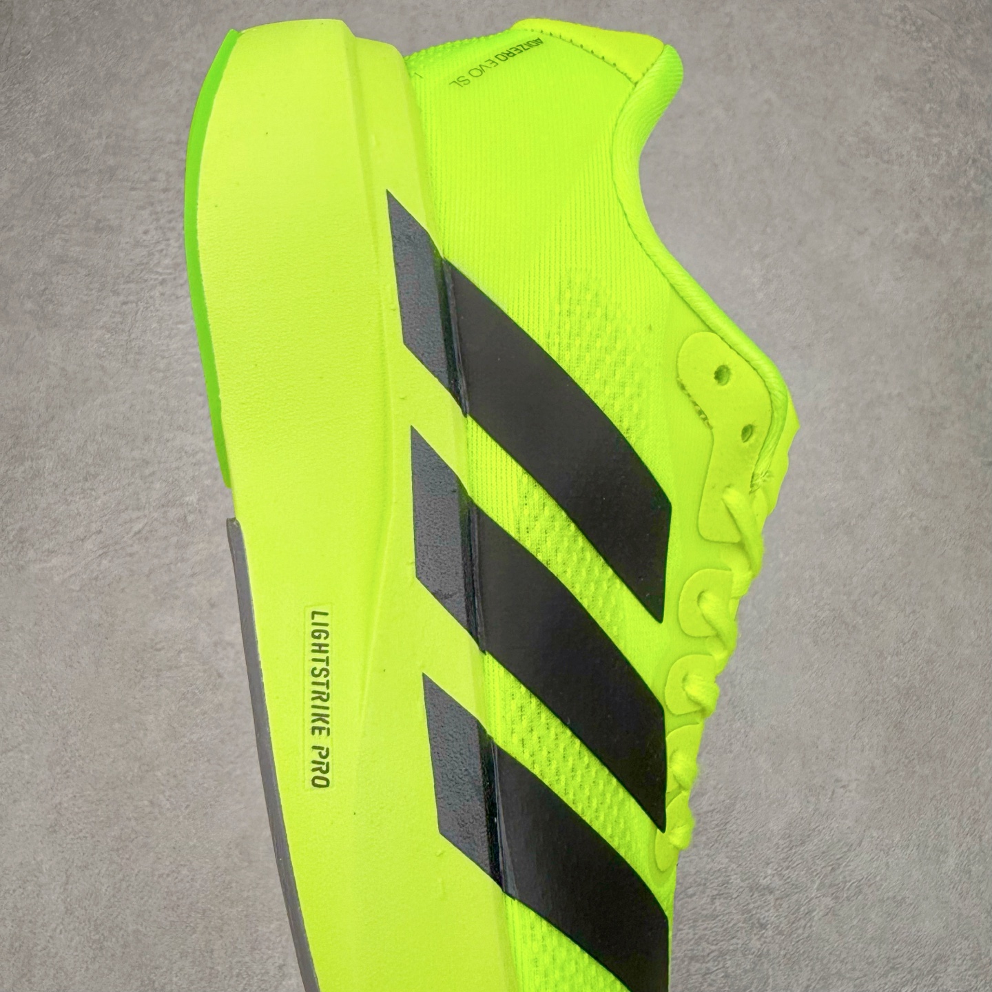 图片[6]-＃福利特价 AD Adizero EVO SL 马拉松竞速专业跑鞋 CELERMESH针织网面非常轻薄 纤维间的缝隙很大 可以保证跑步时的透气、排汗效果 鞋舌直接与两侧的内衬和鞋底连接在一起 在跑步过程中不会被鞋舌的左右移动所困扰 在标准鞋带孔的基础上再拓宽一组鞋带孔 适合不同脚型的需求 突破性 EnergyRods 技术，有助于跑者实现更好的成绩 中底独特的LIGHTSTRIKE PRO泡棉材质 微弹感觉在跑步过程中给予了良好的支撑体验 对于顶级精英和高水平进阶跑者来说 ADIOS PRO是一双值得信赖的竞速比赛用鞋 尺码：36 36.5 37.5 38 38.5 39 40 40.5 41 42 42.5 43 44 44.5 45-选品中心