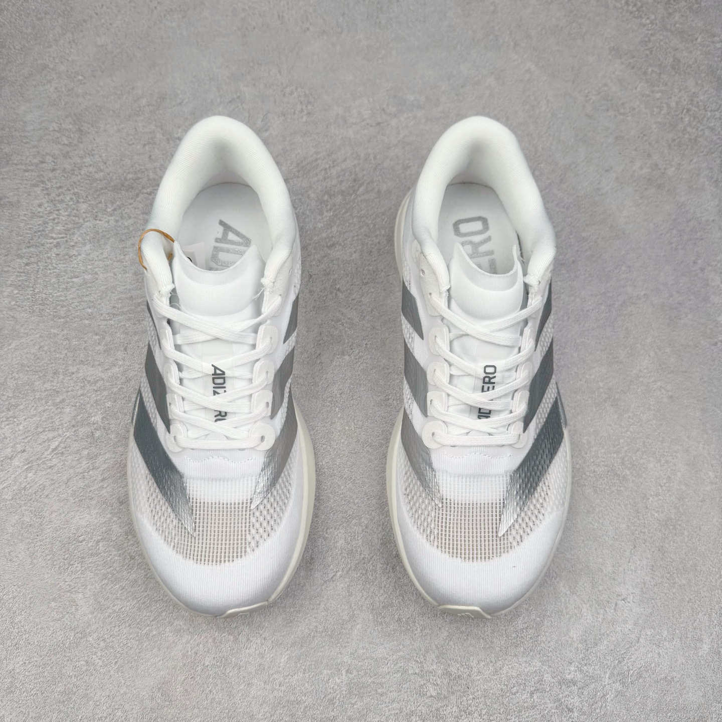 图片[2]-＃福利特价 AD Adizero EVO SL 马拉松竞速专业跑鞋 CELERMESH针织网面非常轻薄 纤维间的缝隙很大 可以保证跑步时的透气、排汗效果 鞋舌直接与两侧的内衬和鞋底连接在一起 在跑步过程中不会被鞋舌的左右移动所困扰 在标准鞋带孔的基础上再拓宽一组鞋带孔 适合不同脚型的需求 突破性 EnergyRods 技术，有助于跑者实现更好的成绩 中底独特的LIGHTSTRIKE PRO泡棉材质 微弹感觉在跑步过程中给予了良好的支撑体验 对于顶级精英和高水平进阶跑者来说 ADIOS PRO是一双值得信赖的竞速比赛用鞋 尺码：36 36.5 37.5 38 38.5 39 40 40.5 41 42 42.5 43 44 44.5 45-选品中心