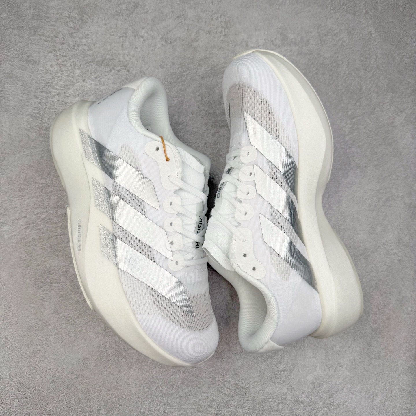 图片[3]-＃福利特价 AD Adizero EVO SL 马拉松竞速专业跑鞋 CELERMESH针织网面非常轻薄 纤维间的缝隙很大 可以保证跑步时的透气、排汗效果 鞋舌直接与两侧的内衬和鞋底连接在一起 在跑步过程中不会被鞋舌的左右移动所困扰 在标准鞋带孔的基础上再拓宽一组鞋带孔 适合不同脚型的需求 突破性 EnergyRods 技术，有助于跑者实现更好的成绩 中底独特的LIGHTSTRIKE PRO泡棉材质 微弹感觉在跑步过程中给予了良好的支撑体验 对于顶级精英和高水平进阶跑者来说 ADIOS PRO是一双值得信赖的竞速比赛用鞋 尺码：36 36.5 37.5 38 38.5 39 40 40.5 41 42 42.5 43 44 44.5 45-选品中心