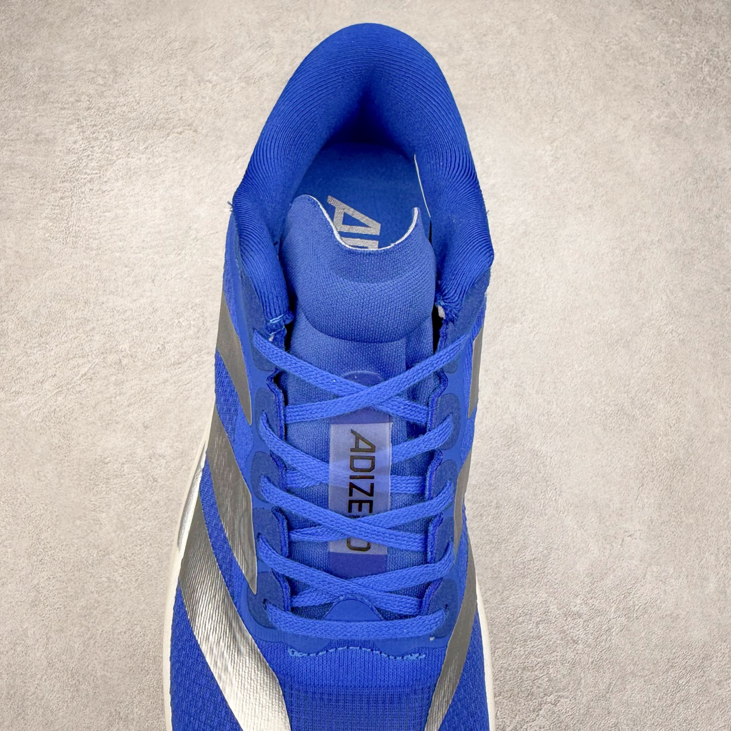 图片[5]-＃福利特价 AD Adizero EVO SL 马拉松竞速专业跑鞋 CELERMESH针织网面非常轻薄 纤维间的缝隙很大 可以保证跑步时的透气、排汗效果 鞋舌直接与两侧的内衬和鞋底连接在一起 在跑步过程中不会被鞋舌的左右移动所困扰 在标准鞋带孔的基础上再拓宽一组鞋带孔 适合不同脚型的需求 突破性 EnergyRods 技术，有助于跑者实现更好的成绩 中底独特的LIGHTSTRIKE PRO泡棉材质 微弹感觉在跑步过程中给予了良好的支撑体验 对于顶级精英和高水平进阶跑者来说 ADIOS PRO是一双值得信赖的竞速比赛用鞋 尺码：36 36.5 37.5 38 38.5 39 40 40.5 41 42 42.5 43 44 44.5 45-选品中心