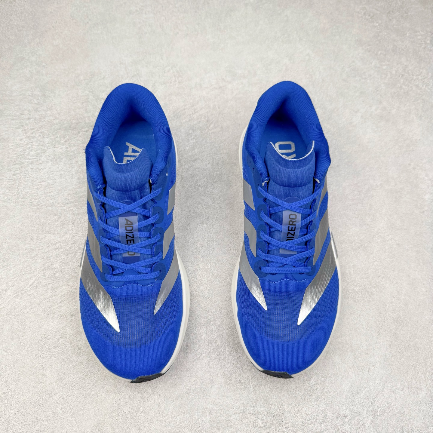 图片[2]-＃福利特价 AD Adizero EVO SL 马拉松竞速专业跑鞋 CELERMESH针织网面非常轻薄 纤维间的缝隙很大 可以保证跑步时的透气、排汗效果 鞋舌直接与两侧的内衬和鞋底连接在一起 在跑步过程中不会被鞋舌的左右移动所困扰 在标准鞋带孔的基础上再拓宽一组鞋带孔 适合不同脚型的需求 突破性 EnergyRods 技术，有助于跑者实现更好的成绩 中底独特的LIGHTSTRIKE PRO泡棉材质 微弹感觉在跑步过程中给予了良好的支撑体验 对于顶级精英和高水平进阶跑者来说 ADIOS PRO是一双值得信赖的竞速比赛用鞋 尺码：36 36.5 37.5 38 38.5 39 40 40.5 41 42 42.5 43 44 44.5 45-选品中心