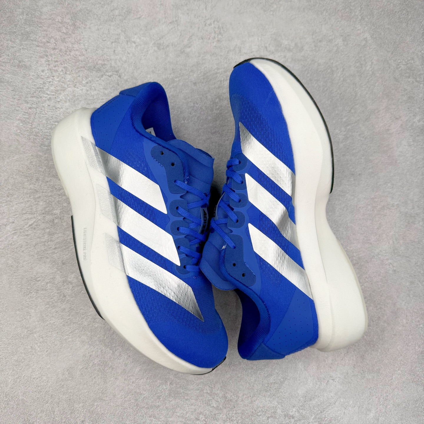 图片[3]-＃福利特价 AD Adizero EVO SL 马拉松竞速专业跑鞋 CELERMESH针织网面非常轻薄 纤维间的缝隙很大 可以保证跑步时的透气、排汗效果 鞋舌直接与两侧的内衬和鞋底连接在一起 在跑步过程中不会被鞋舌的左右移动所困扰 在标准鞋带孔的基础上再拓宽一组鞋带孔 适合不同脚型的需求 突破性 EnergyRods 技术，有助于跑者实现更好的成绩 中底独特的LIGHTSTRIKE PRO泡棉材质 微弹感觉在跑步过程中给予了良好的支撑体验 对于顶级精英和高水平进阶跑者来说 ADIOS PRO是一双值得信赖的竞速比赛用鞋 尺码：36 36.5 37.5 38 38.5 39 40 40.5 41 42 42.5 43 44 44.5 45-选品中心