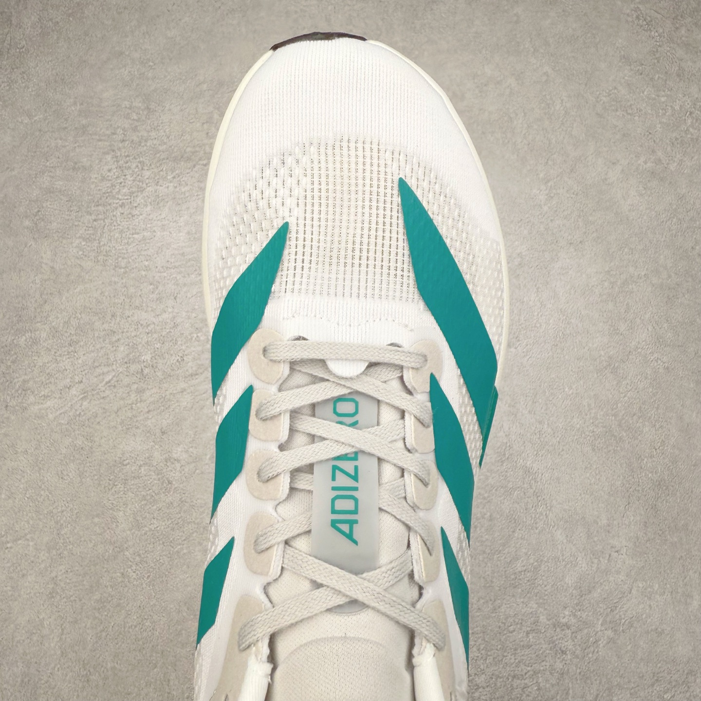 图片[4]-＃福利特价 AD Adizero EVO SL 马拉松竞速专业跑鞋 CELERMESH针织网面非常轻薄 纤维间的缝隙很大 可以保证跑步时的透气、排汗效果 鞋舌直接与两侧的内衬和鞋底连接在一起 在跑步过程中不会被鞋舌的左右移动所困扰 在标准鞋带孔的基础上再拓宽一组鞋带孔 适合不同脚型的需求 突破性 EnergyRods 技术，有助于跑者实现更好的成绩 中底独特的LIGHTSTRIKE PRO泡棉材质 微弹感觉在跑步过程中给予了良好的支撑体验 对于顶级精英和高水平进阶跑者来说 ADIOS PRO是一双值得信赖的竞速比赛用鞋 尺码：36 36.5 37.5 38 38.5 39 40 40.5 41 42 42.5 43 44 44.5 45-选品中心