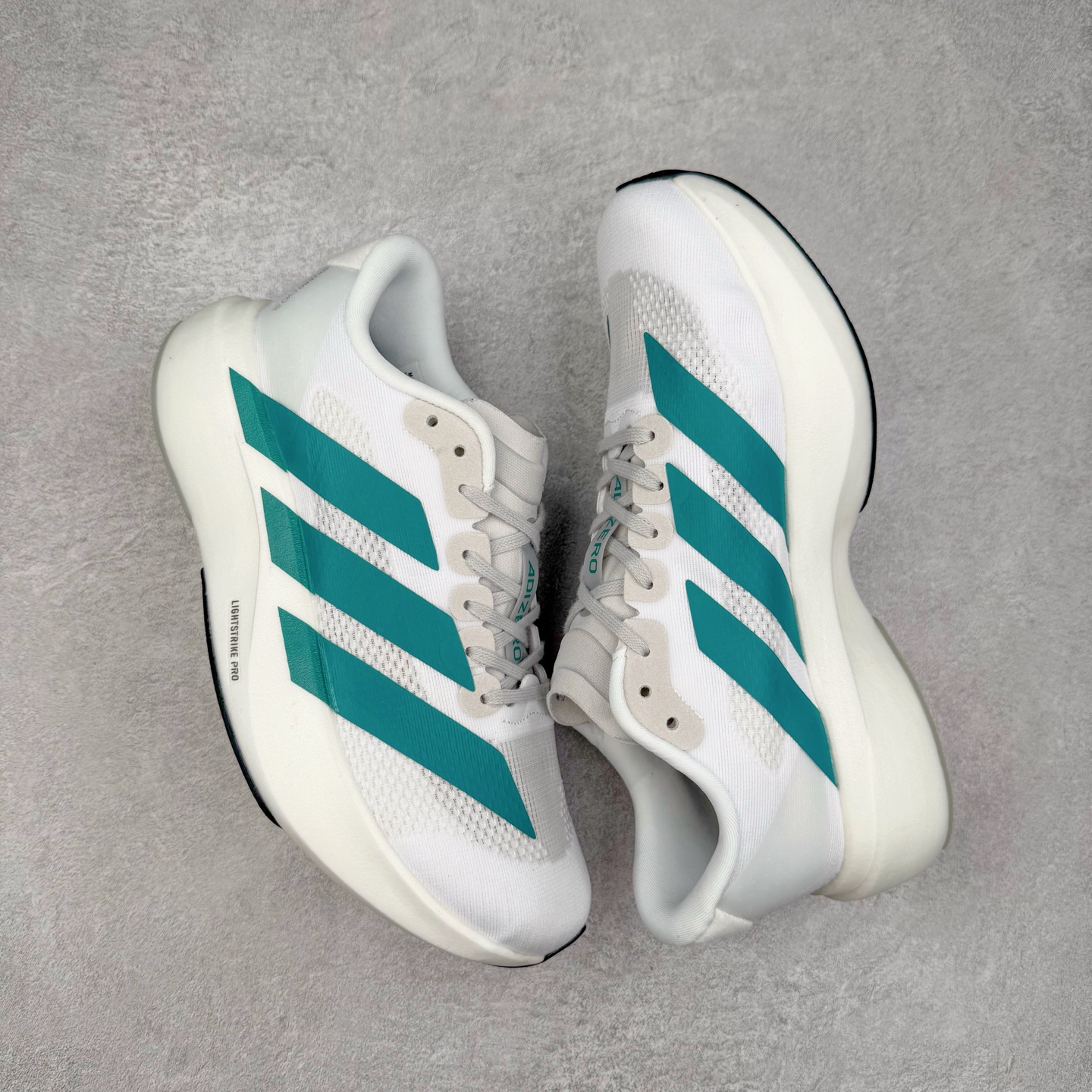 图片[3]-＃福利特价 AD Adizero EVO SL 马拉松竞速专业跑鞋 CELERMESH针织网面非常轻薄 纤维间的缝隙很大 可以保证跑步时的透气、排汗效果 鞋舌直接与两侧的内衬和鞋底连接在一起 在跑步过程中不会被鞋舌的左右移动所困扰 在标准鞋带孔的基础上再拓宽一组鞋带孔 适合不同脚型的需求 突破性 EnergyRods 技术，有助于跑者实现更好的成绩 中底独特的LIGHTSTRIKE PRO泡棉材质 微弹感觉在跑步过程中给予了良好的支撑体验 对于顶级精英和高水平进阶跑者来说 ADIOS PRO是一双值得信赖的竞速比赛用鞋 尺码：36 36.5 37.5 38 38.5 39 40 40.5 41 42 42.5 43 44 44.5 45-选品中心