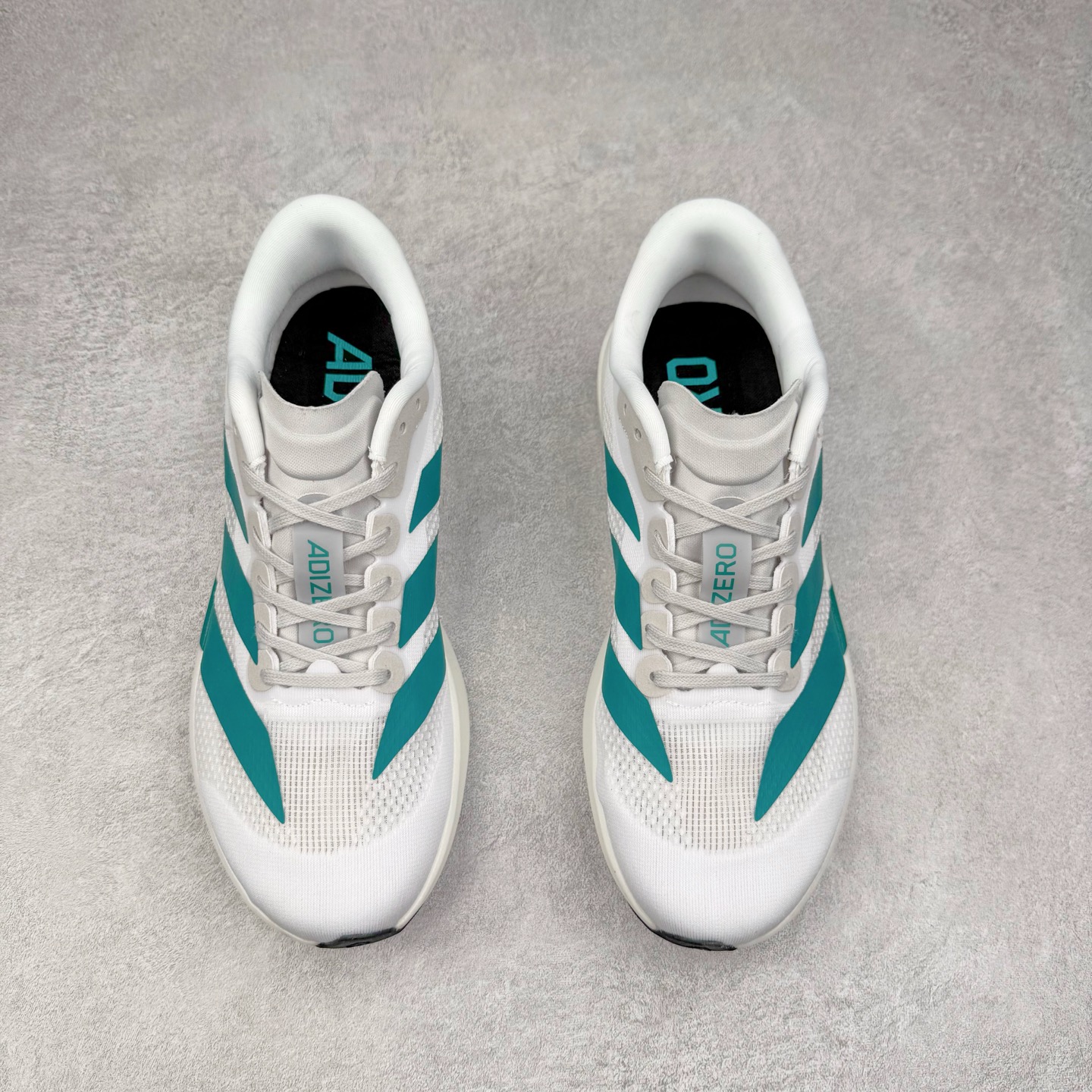 图片[2]-＃福利特价 AD Adizero EVO SL 马拉松竞速专业跑鞋 CELERMESH针织网面非常轻薄 纤维间的缝隙很大 可以保证跑步时的透气、排汗效果 鞋舌直接与两侧的内衬和鞋底连接在一起 在跑步过程中不会被鞋舌的左右移动所困扰 在标准鞋带孔的基础上再拓宽一组鞋带孔 适合不同脚型的需求 突破性 EnergyRods 技术，有助于跑者实现更好的成绩 中底独特的LIGHTSTRIKE PRO泡棉材质 微弹感觉在跑步过程中给予了良好的支撑体验 对于顶级精英和高水平进阶跑者来说 ADIOS PRO是一双值得信赖的竞速比赛用鞋 尺码：36 36.5 37.5 38 38.5 39 40 40.5 41 42 42.5 43 44 44.5 45-选品中心