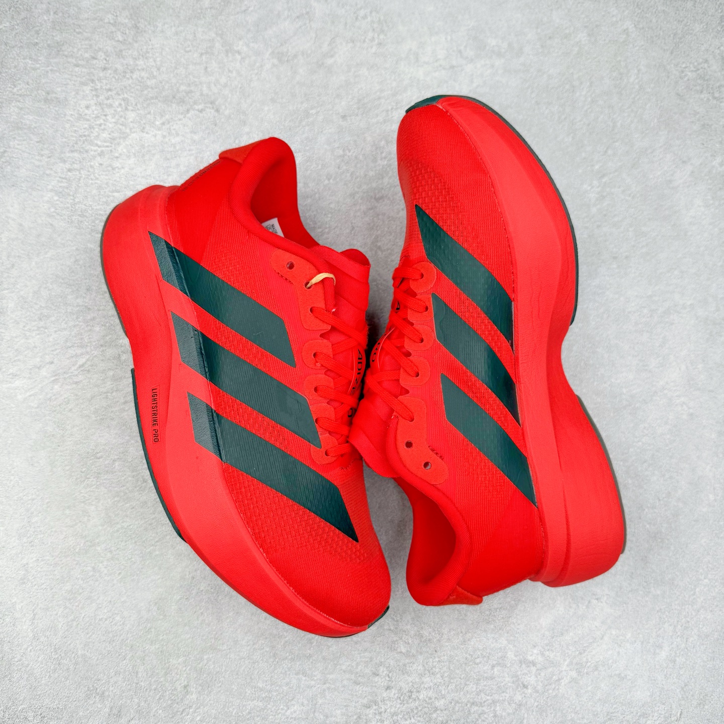 图片[3]-＃福利特价 AD Adizero EVO SL 马拉松竞速专业跑鞋 CELERMESH针织网面非常轻薄 纤维间的缝隙很大 可以保证跑步时的透气、排汗效果 鞋舌直接与两侧的内衬和鞋底连接在一起 在跑步过程中不会被鞋舌的左右移动所困扰 在标准鞋带孔的基础上再拓宽一组鞋带孔 适合不同脚型的需求 突破性 EnergyRods 技术，有助于跑者实现更好的成绩 中底独特的LIGHTSTRIKE PRO泡棉材质 微弹感觉在跑步过程中给予了良好的支撑体验 对于顶级精英和高水平进阶跑者来说 ADIOS PRO是一双值得信赖的竞速比赛用鞋 尺码：36 36.5 37.5 38 38.5 39 40 40.5 41 42 42.5 43 44 44.5 45-选品中心