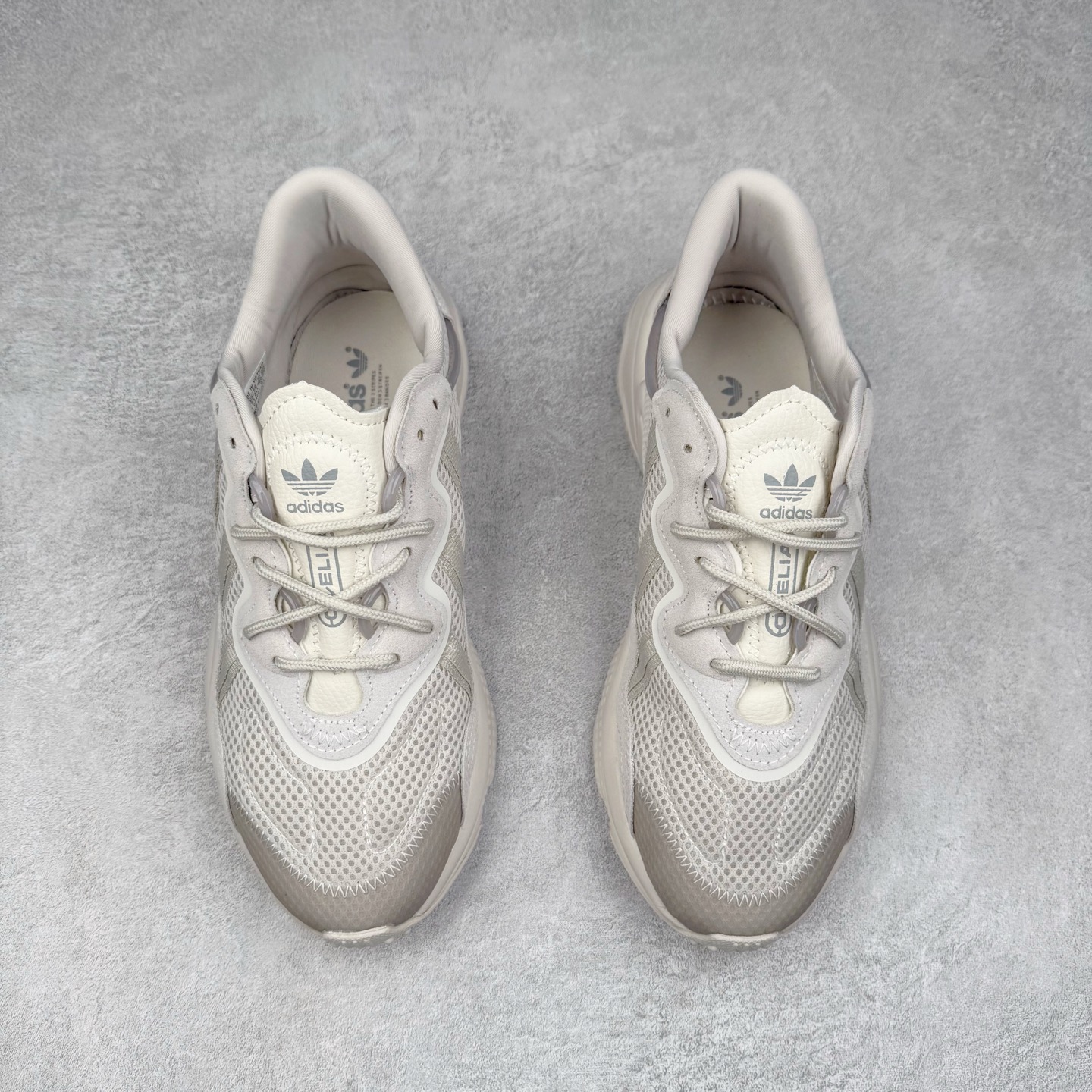 图片[2]-AD Originals OZWEEGO 简版椰子3M反光皮面水管复古老爹鞋 鞋面透气织物与出众皮革相互拼接 营造丰富层次 中底 adiPRENE+ 则提供穿着过程中的优良支撑 进一步提升舒适度 特别之处在于后跟半透明导管加持 个性又独特 最后辅以醒目色调营造强烈视觉反差 不凡的吸睛效果让人过目难忘 尺码：36 36.5 37 38 38.5 39 40 40.5 41 42 42.5 43 44 44.5 45-选品中心