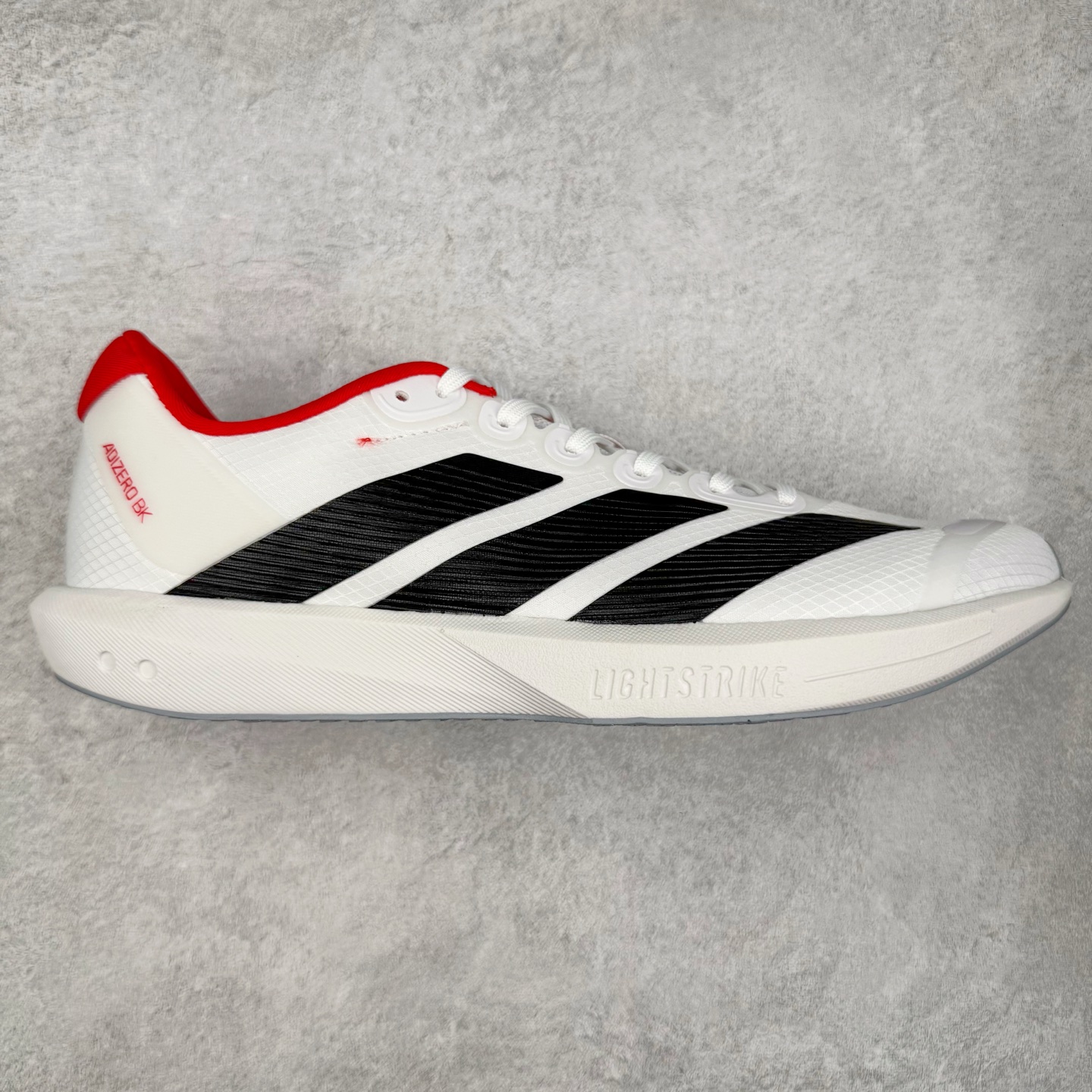 AD Adizero BK 夏季透气网眼竞速跑鞋 JP6529 融合Lightstrike和Lightstrike Pro技术 采用乙烯/乙酸乙烯酯(EVA)材质 打造舒适中底 含ENERGYROD能量碳柱 旨在为步伐添活力 尺码：36 36.5 37 38 38.5 39 40 40.5 41 42 42.5 43 44 44.5 45-选品中心