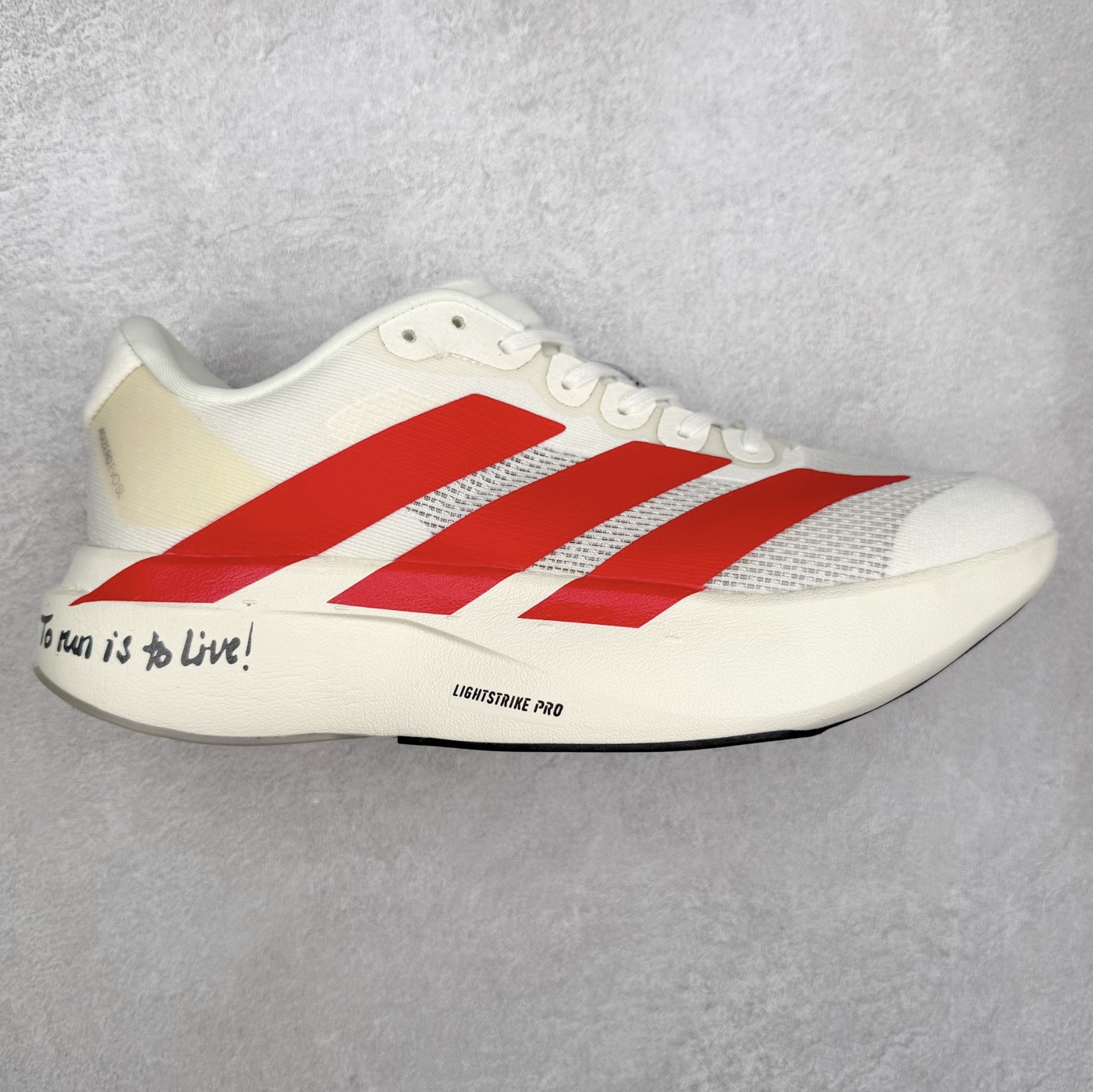 AD Adizero EVO SL 马拉松竞速专业跑鞋 CELERMESH针织网面非常轻薄 纤维间的缝隙很大 可以保证跑步时的透气、排汗效果 鞋舌直接与两侧的内衬和鞋底连接在一起 在跑步过程中不会被鞋舌的左右移动所困扰 在标准鞋带孔的基础上再拓宽一组鞋带孔 适合不同脚型的需求 突破性 EnergyRods 技术，有助于跑者实现更好的成绩 中底独特的LIGHTSTRIKE PRO泡棉材质 微弹感觉在跑步过程中给予了良好的支撑体验 对于顶级精英和高水平进阶跑者来说 ADIOS PRO是一双值得信赖的竞速比赛用鞋 尺码：36 36.5 37.5 38 38.5 39 40 40.5 41 42 42.5 43 44 44.5 45-选品中心