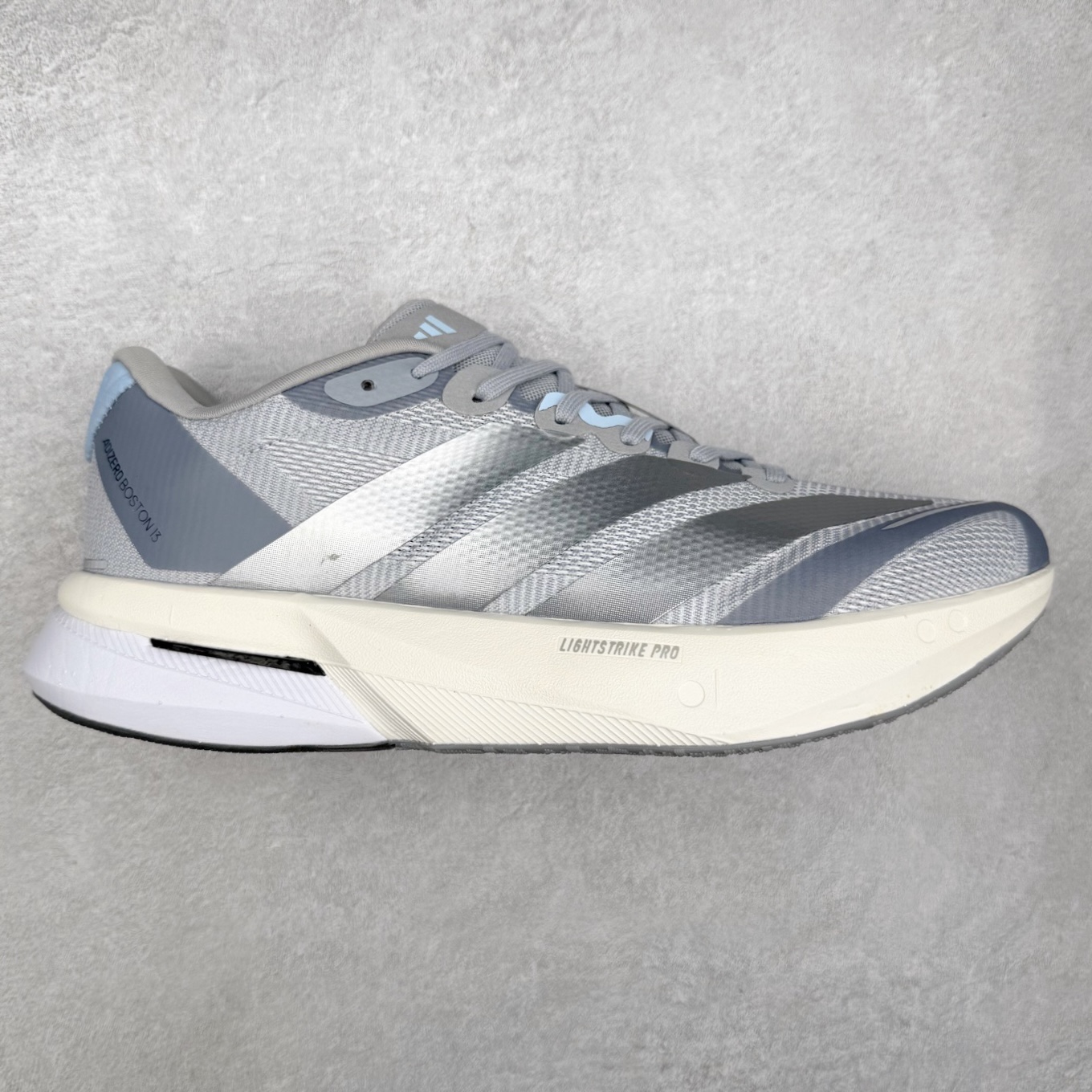 AD Adizero Boston 13 夏季透气网眼竞速跑鞋 JS4949 融合Lightstrike和Lightstrike Pro技术 采用乙烯/乙酸乙烯酯(EVA)材质 打造舒适中底 含ENERGYROD能量碳柱 旨在为步伐添活力 尺码：36 36.5 37 38 38.5 39 40 40.5 41 42 42.5 43 44 44.5 45-选品中心