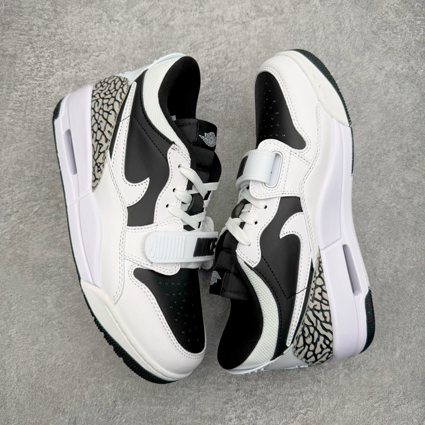 图片[3]-＃KZ神版 Air Jordan Legacy AJ312 复古篮球鞋 CD7069-111 市场最强独一档产物 全套原纸板楦头开发 原厂大底磨具加持立体防滑纹理 原档数据后跟TPU子母扣魔术贴 原装可视Air Sole气垫 原汁原味最完美的312代版型 唯一正确鞋头趴度弧度高度鞋身腰线 进口港宝加持 后跟自然饱满 全鞋荧光划线卡点 追求极致完美 每一双都是工艺品 多重QC质检 超越公司货的品控标准 实实在在的免检产品 鞋身采用了皮革材质打造 横跨鞋面的魔术贴十分吸睛 侧面的Swoosh Logo的一部分被鞋面遮挡了一部分 颇具玩味 魔术贴上标有NK标识 而鞋舌上是Jordan的经典红色飞翼Logo 后跟和鞋底均采用了AJ3的设计 后跟上同样也使用了经典的爆裂纹图案 尺码：36 36.5 37.5 38 38.5 39 40 40.5 41 42 42.5 43 44 44.5 45 46 47.5-选品中心