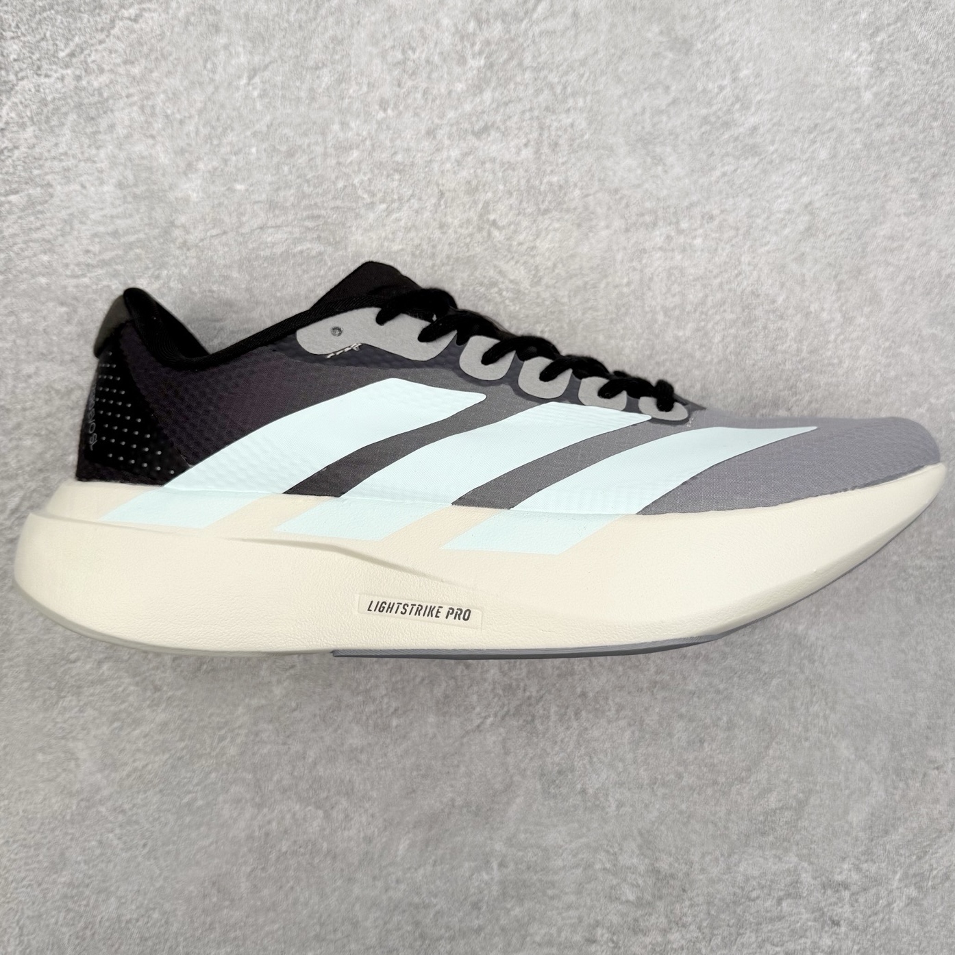 AD Adizero EVO SL 2 马拉松竞速专业跑鞋 CELERMESH针织网面非常轻薄 纤维间的缝隙很大 可以保证跑步时的透气、排汗效果 鞋舌直接与两侧的内衬和鞋底连接在一起 在跑步过程中不会被鞋舌的左右移动所困扰 在标准鞋带孔的基础上再拓宽一组鞋带孔 适合不同脚型的需求 突破性 EnergyRods 技术，有助于跑者实现更好的成绩 中底独特的LIGHTSTRIKE PRO泡棉材质 微弹感觉在跑步过程中给予了良好的支撑体验 对于顶级精英和高水平进阶跑者来说 ADIOS PRO是一双值得信赖的竞速比赛用鞋 尺码：36 36.5 37.5 38 38.5 39 40 40.5 41 42 42.5 43 44 44.5 45-选品中心