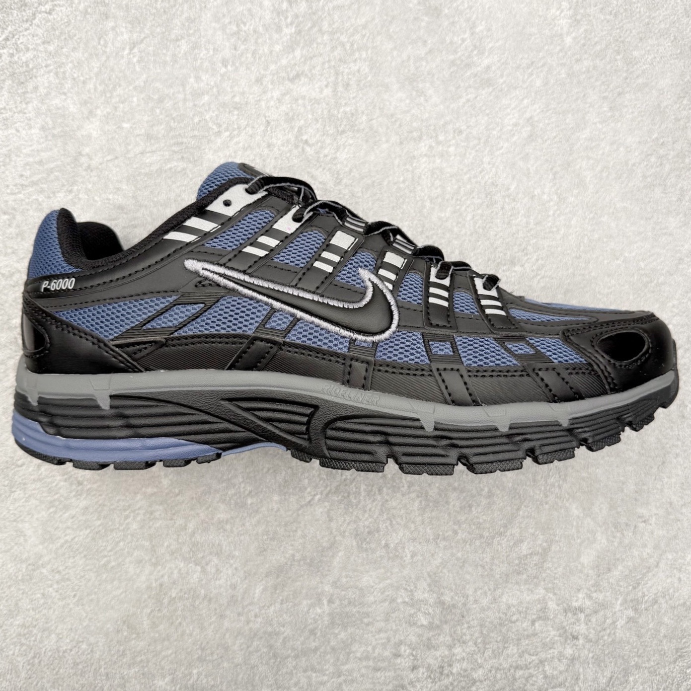 NK P-6000 系列低帮复古老爹风休闲运动舒适慢跑鞋 IQ0296-491 融合 Pegasus 过往运动鞋设计 助力 21 世纪早期跑步运动跃升时尚新高度 采用透气网眼布、运动风格线条和耐穿覆面 兼具吸睛外观和舒适感受 中底泡绵以田径赛道为灵感 打造厚实设计 缔造出众缓震性能 尺码：36 36.5 37.5 38 38.5 39 40 40.5 41 42 42.5 43 44 44.5 45-选品中心