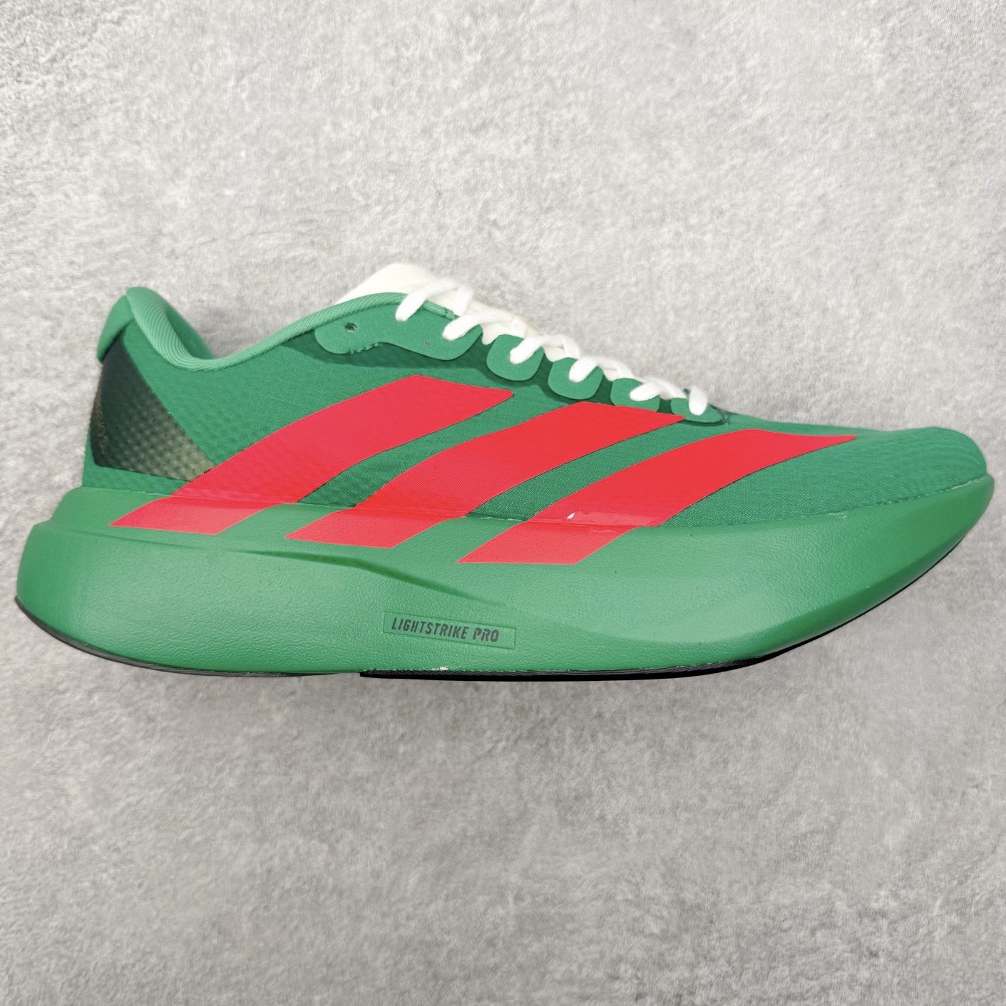 AD Adizero EVO SL WOVEN 马拉松竞速专业跑鞋 CELERMESH针织网面非常轻薄 纤维间的缝隙很大 可以保证跑步时的透气、排汗效果 鞋舌直接与两侧的内衬和鞋底连接在一起 在跑步过程中不会被鞋舌的左右移动所困扰 在标准鞋带孔的基础上再拓宽一组鞋带孔 适合不同脚型的需求 突破性 EnergyRods 技术，有助于跑者实现更好的成绩 中底独特的LIGHTSTRIKE PRO泡棉材质 微弹感觉在跑步过程中给予了良好的支撑体验 对于顶级精英和高水平进阶跑者来说 ADIOS PRO是一双值得信赖的竞速比赛用鞋 尺码：36 36.5 37.5 38 38.5 39 40 40.5 41 42 42.5 43 44 44.5 45-选品中心