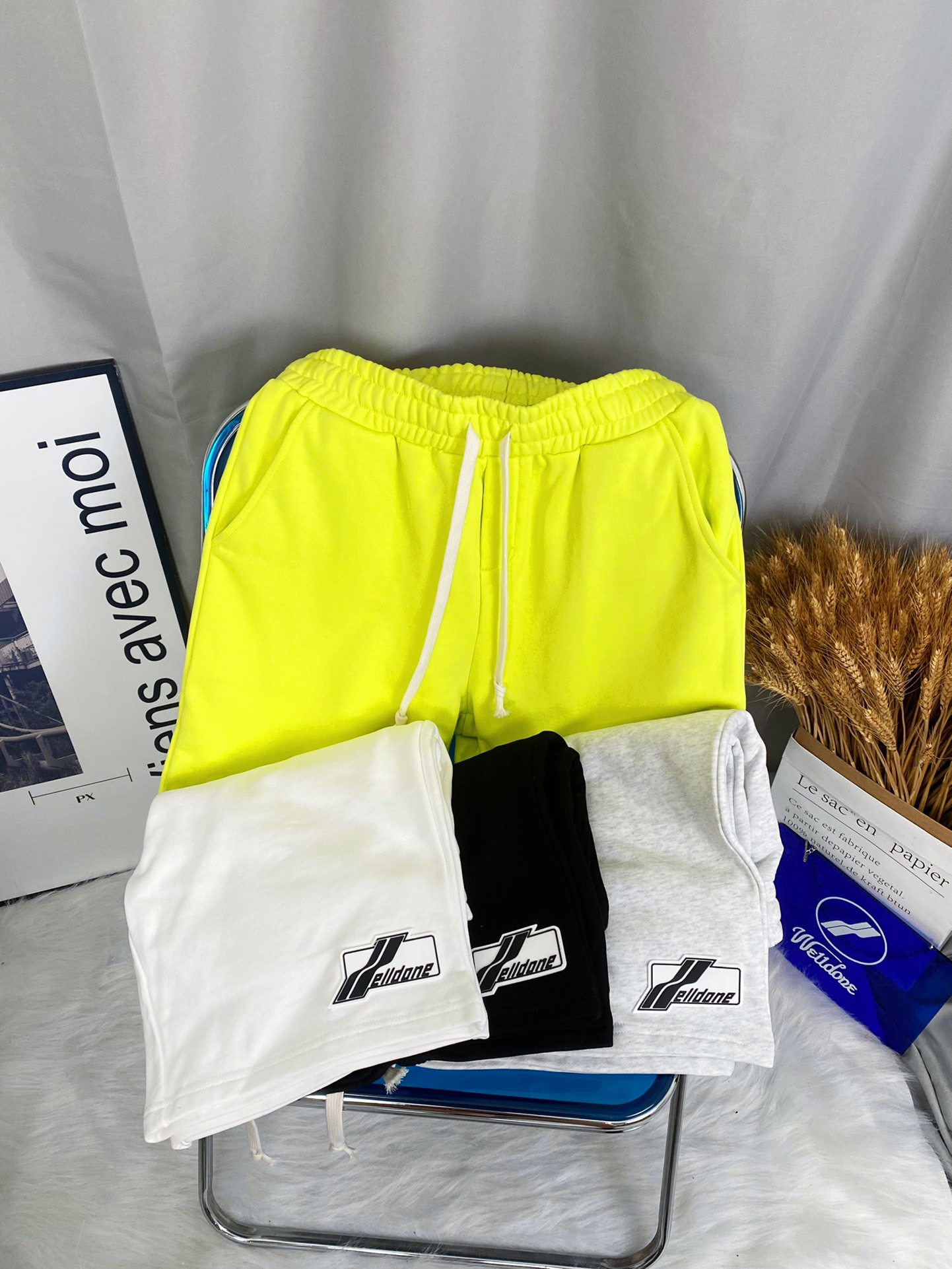 K12# Sincronizado con el sitio web oficial de WE11DONE, pantalones cortos casuales con logotipo de silicona y cordón el…