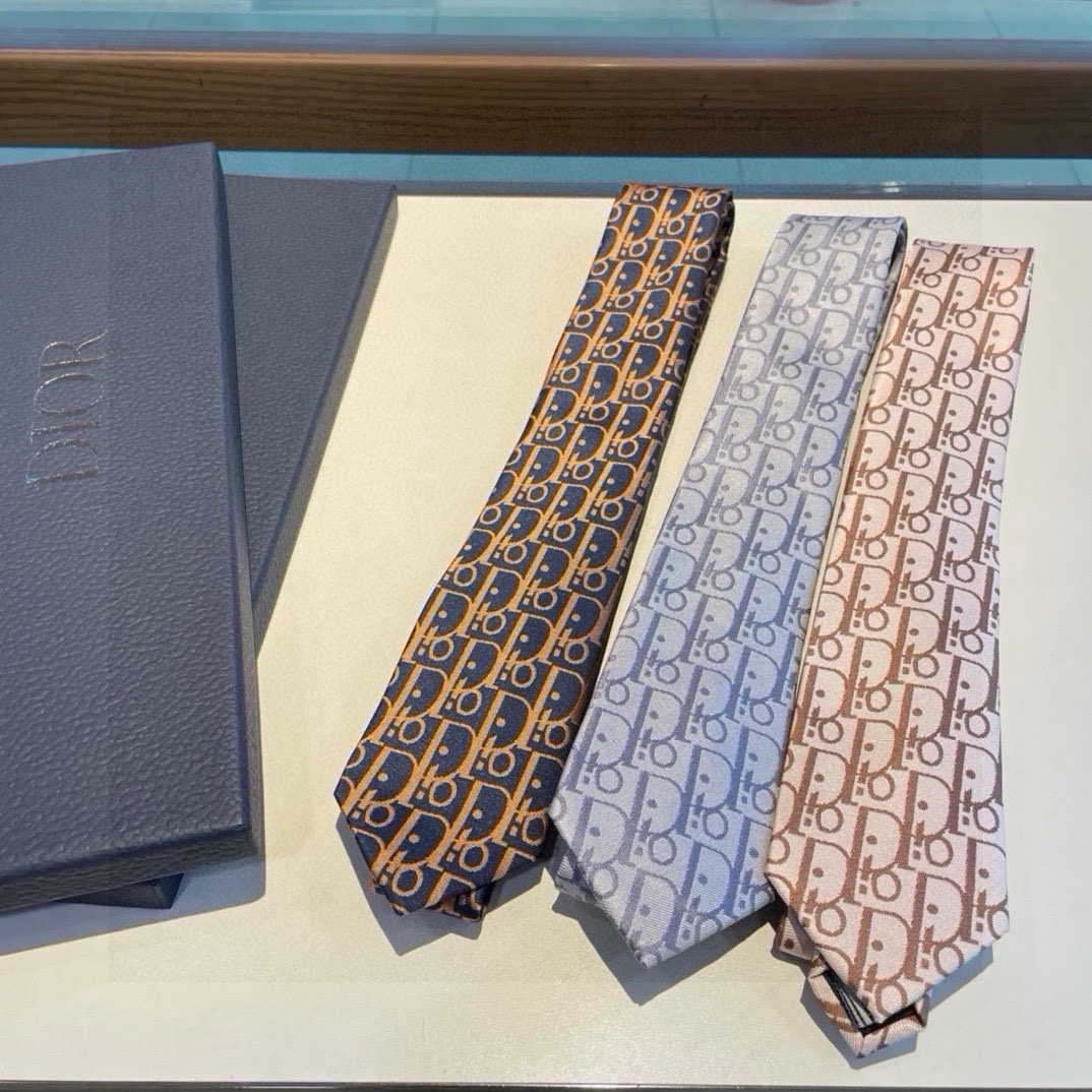 “Dior Man’s CD Tie: Iconic Logo for Finer Fashion Statement”