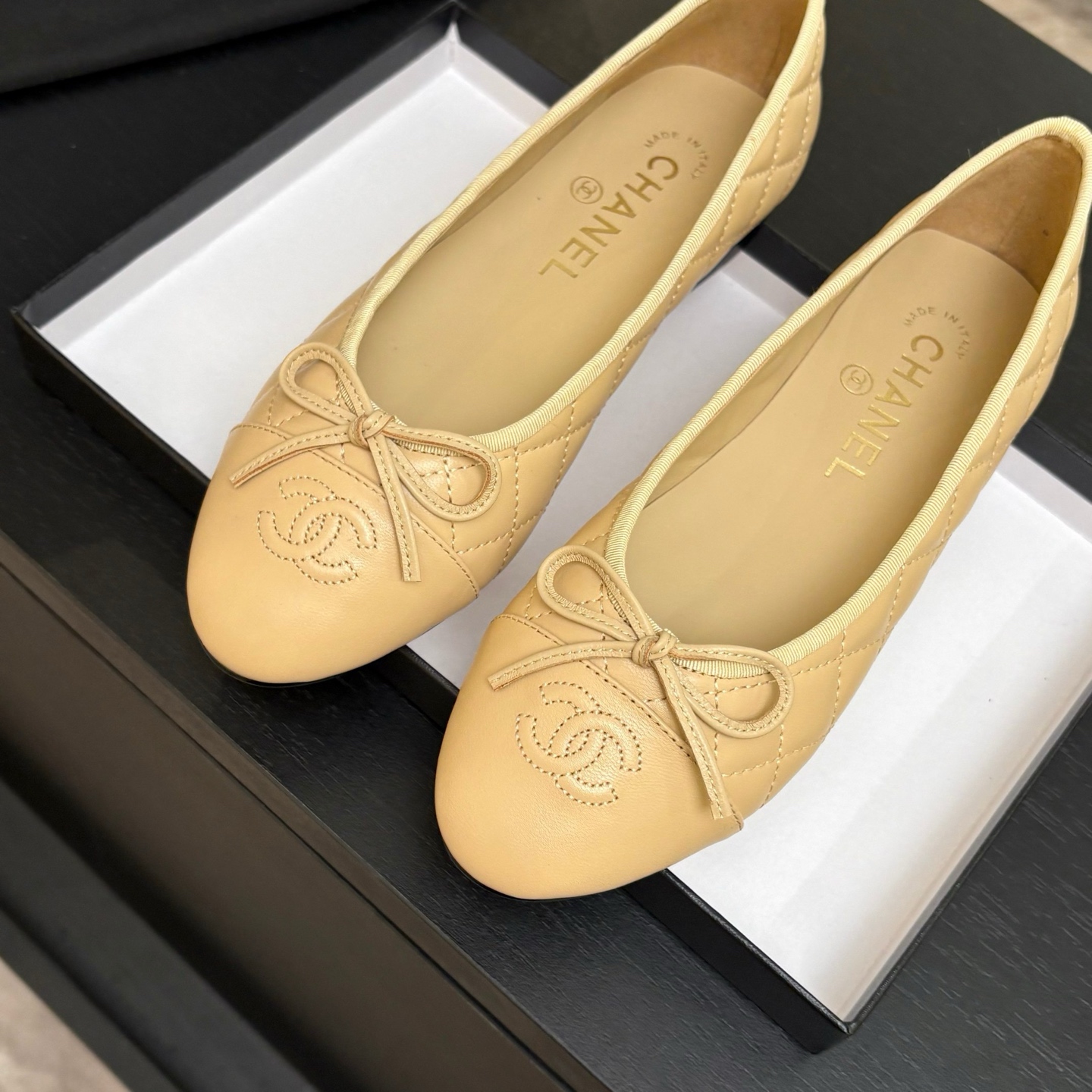 Chanel Quilted Cap-Toe Ballet Flats