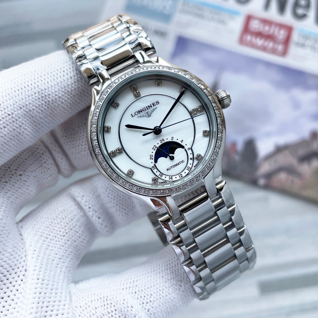 NO:943254,Stainless Steel. Diamond Longines LONGINES | New Longines Quartz Watch The newly designed Heart Moon Series Star Watch with a 34mm dial. This reinvention explains the true elegance of the brand concept, which is constantly evolving, but always maintains its eternal essence, longines19860909白钢.钻浪琴LONGINES | 新款浪琴石英表全新设计的心月系列星辰腕表,表盘34mm这一重塑之作诠释了品牌理念真正的优雅在不断演变,但始终保持其永恒的本质,,longines,Watch