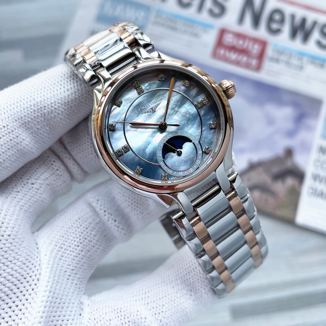 NO:943268,Stainless Steel. Diamond Longines LONGINES | New Longines Quartz Watch The newly designed Heart Moon Series Star Watch with a 34mm dial. This reinvention explains the true elegance of the brand concept, which is constantly evolving, but always maintains its eternal essence, longines19860909白钢.钻浪琴LONGINES | 新款浪琴石英表全新设计的心月系列星辰腕表,表盘34mm这一重塑之作诠释了品牌理念真正的优雅在不断演变,但始终保持其永恒的本质,,longines,Watch