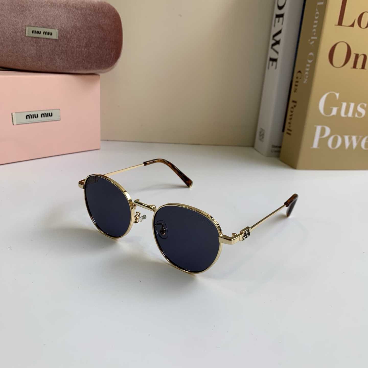 Солнечные очки Miu Miu золотые круглые