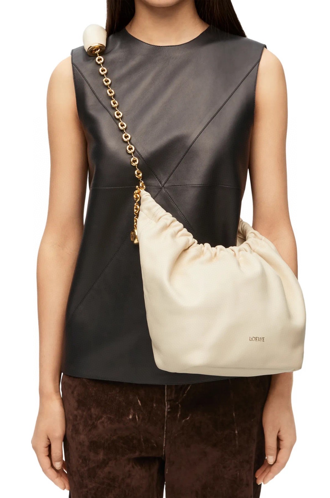 Loewesmall sizeItalian lambskin nappa leather inside and outside, all steel hardware! The Loewe Squeeze collection features a surprisingly lightw