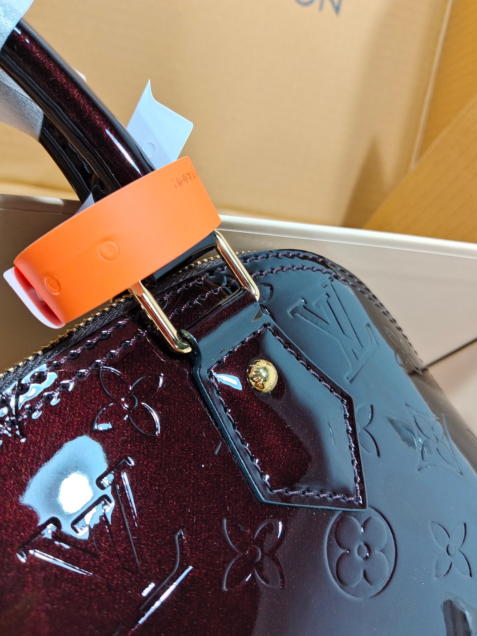 Louis Vuitton Boutique Lvjia lacquered cowhide shell bag
