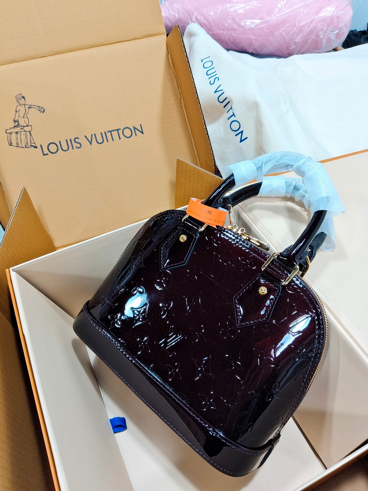 Louis Vuitton Boutique Lvjia lacquered cowhide shell bag