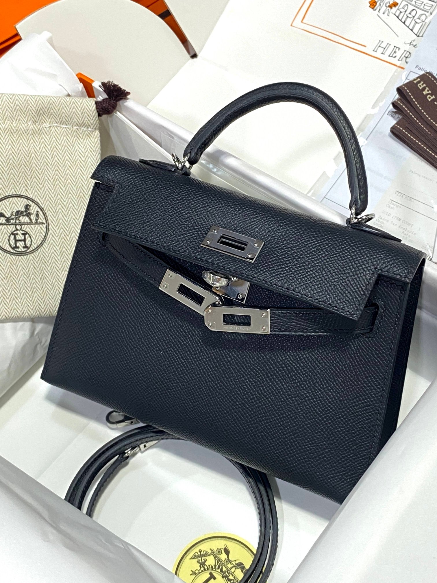 Hermès Restrained and calm, rejuvenating mini Kelly second generation, black, silver buckle, thick imported hardware, epsom leather with sheepski
