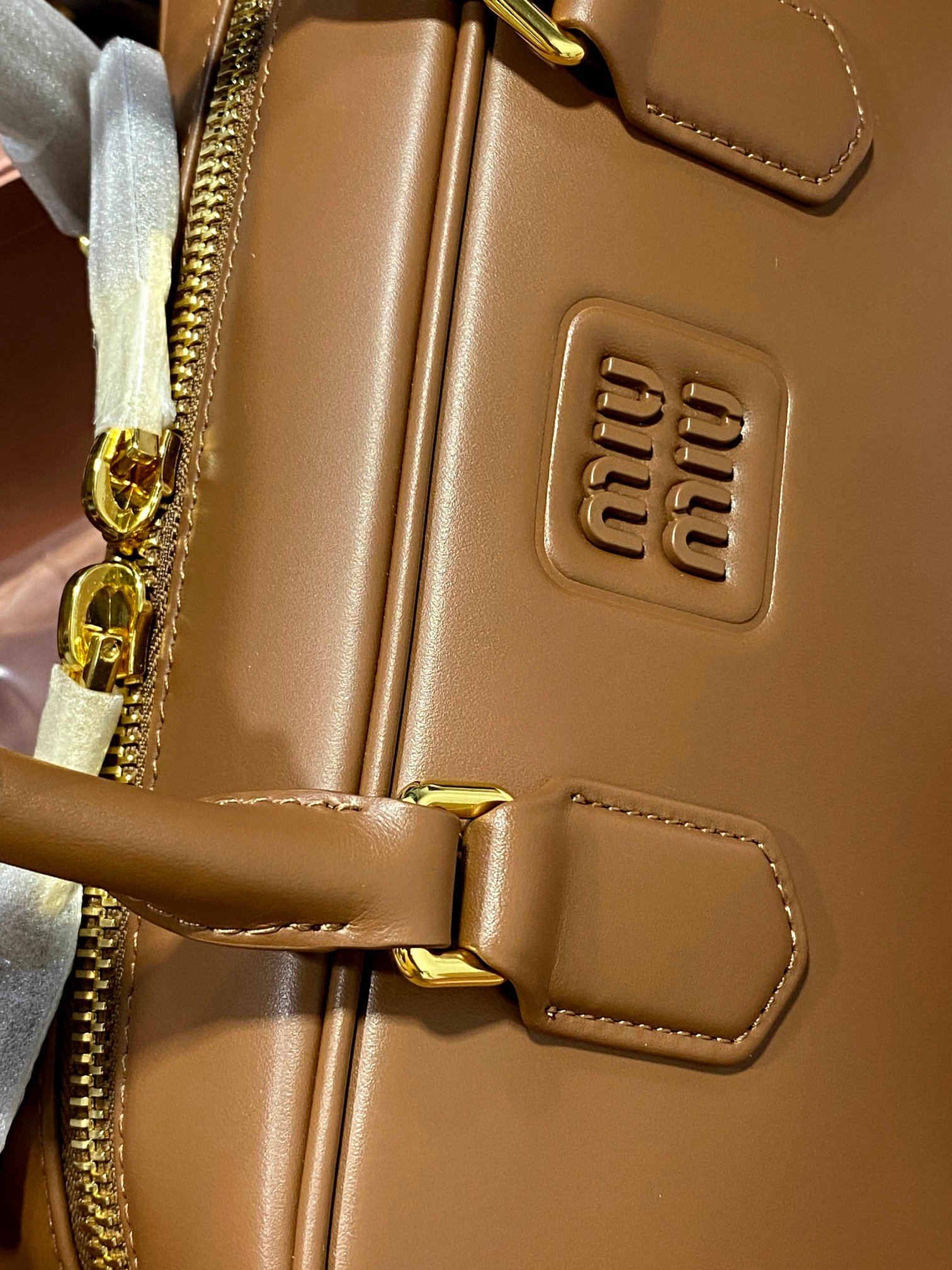 Miu Miu Come, for those of you who are curious, take real photos of the delivery.