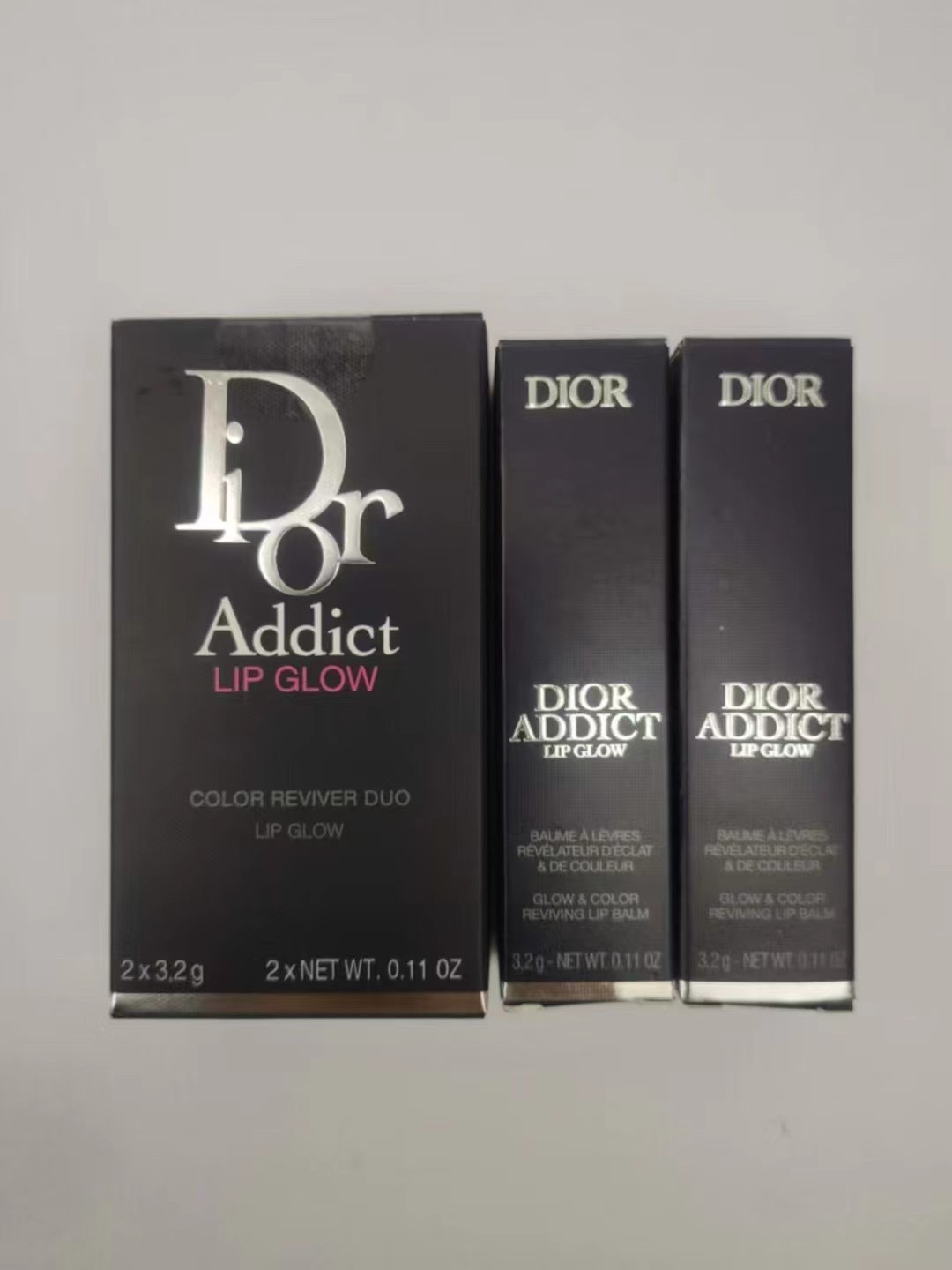 50! ¡Precio ajustado! (Set de dos bálsamos labiales Dior Addict Lip Glow versión 24) 🔜 3.2 g × 2. Tonos: 001#, 004#.