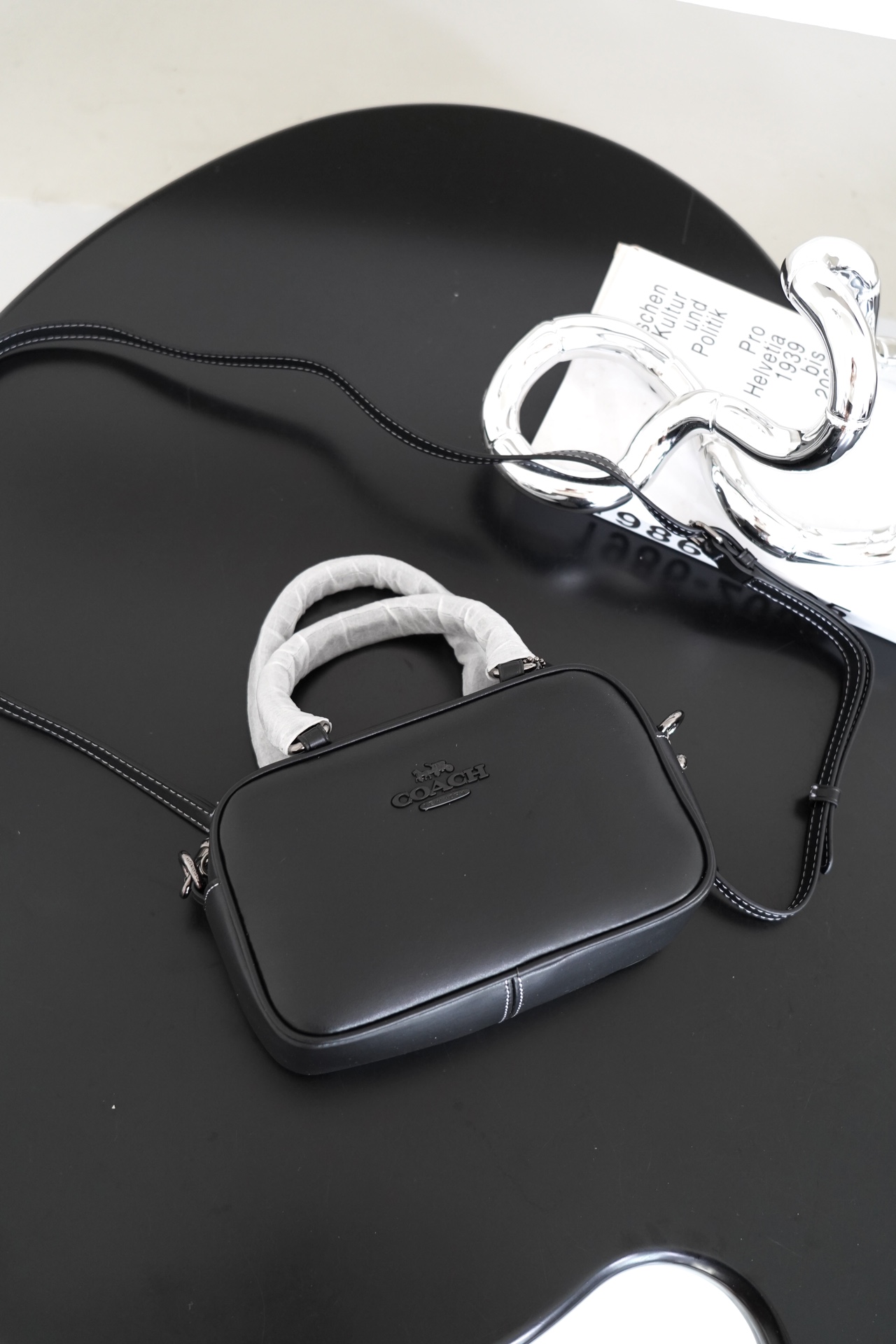 COACH Satchel枕头包 - シンプルでエレガントなデザイン