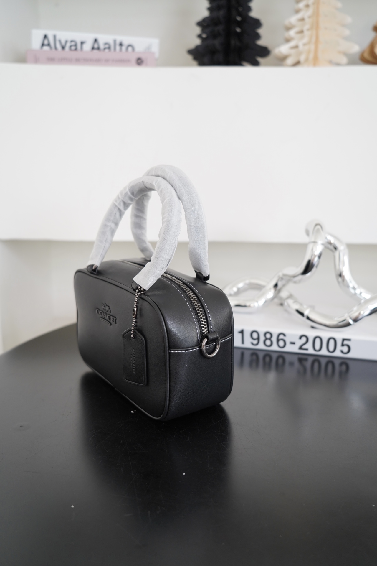 COACH Satchel枕头包 - シンプルでエレガントなデザイン