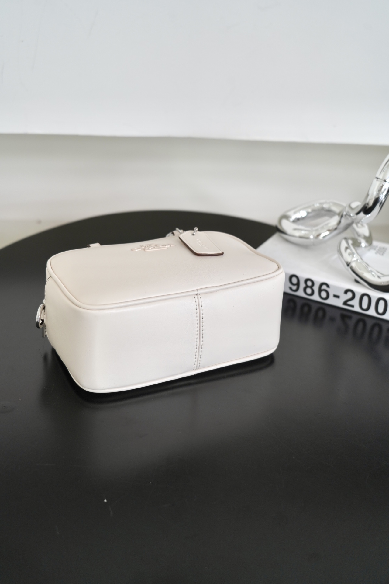 COACH Satchel枕头包 - スタイリッシュなデザインと機能性