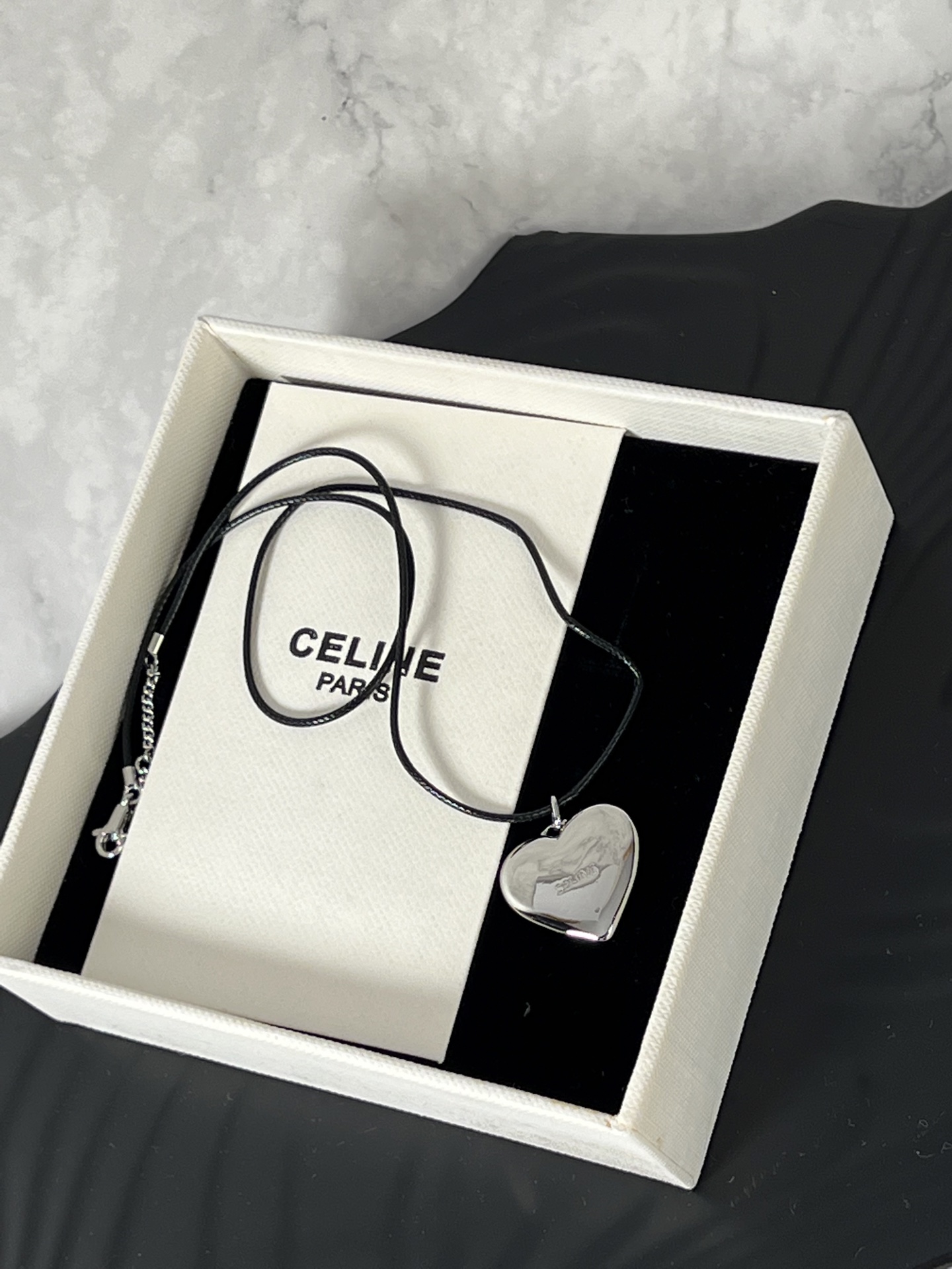 Celine Triomphe Puffy Heart necklace Silver-toned metal with black leather cord 45cm with 5cm extender